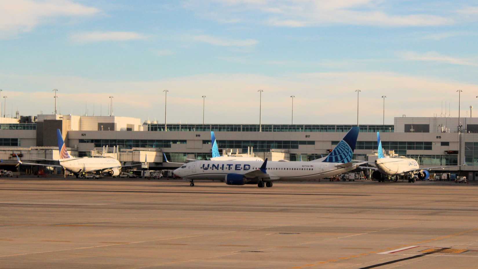 United Airlines aircraft parked on gates at the B Concourse in the Denver International Airport