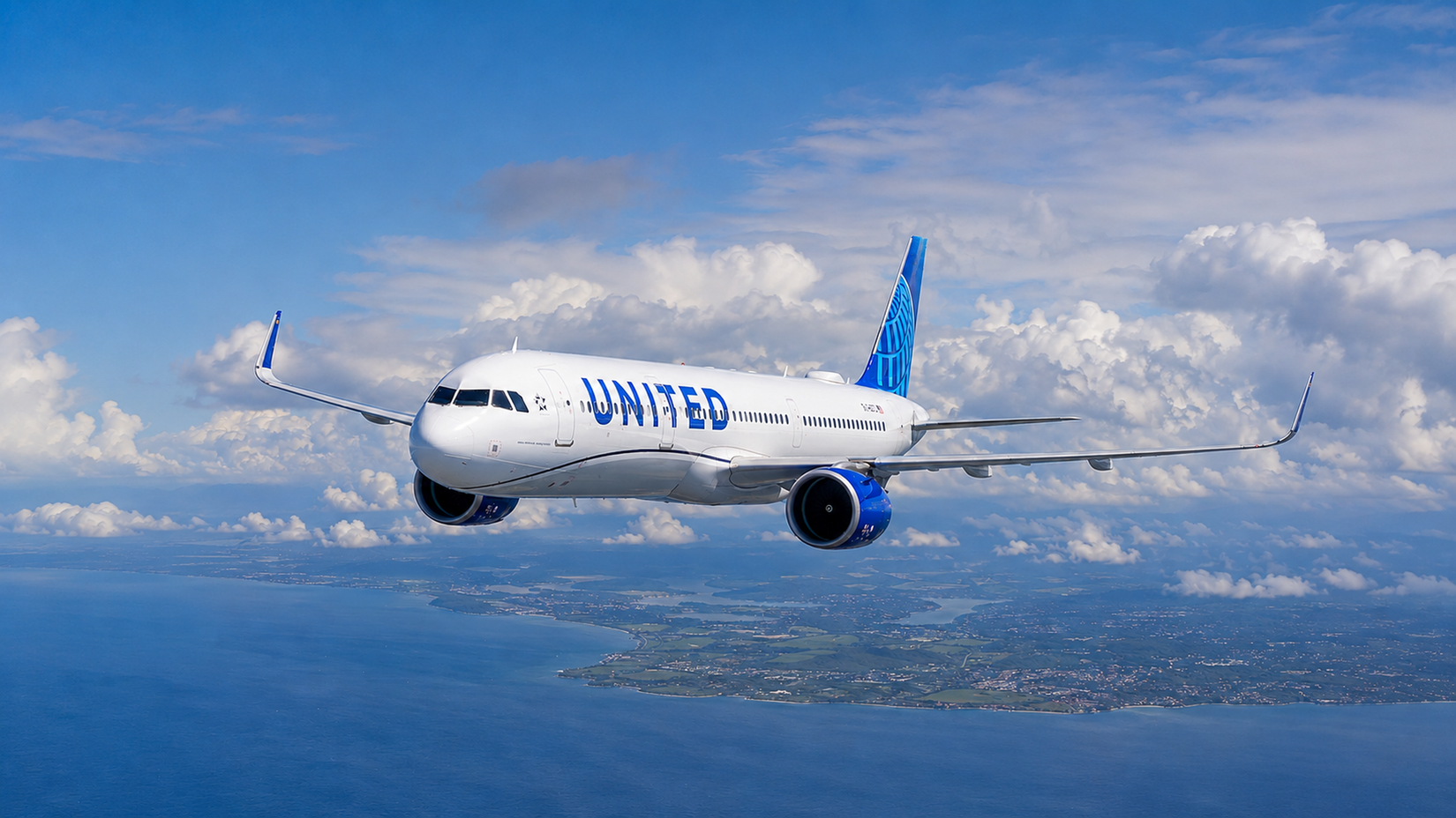 United Airlines Airbus A321XLR flying over the coast