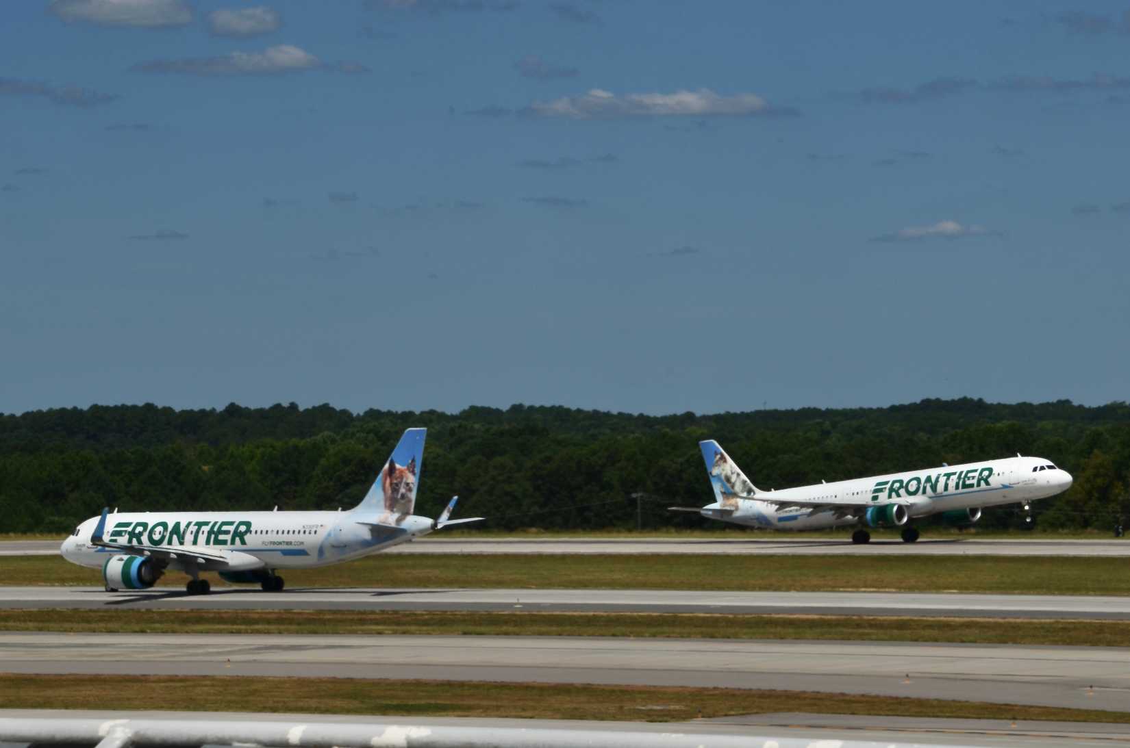  An Airbus A320neo (N330FR) and A321-200 (N717FR) at Raleigh-Durham International Airport