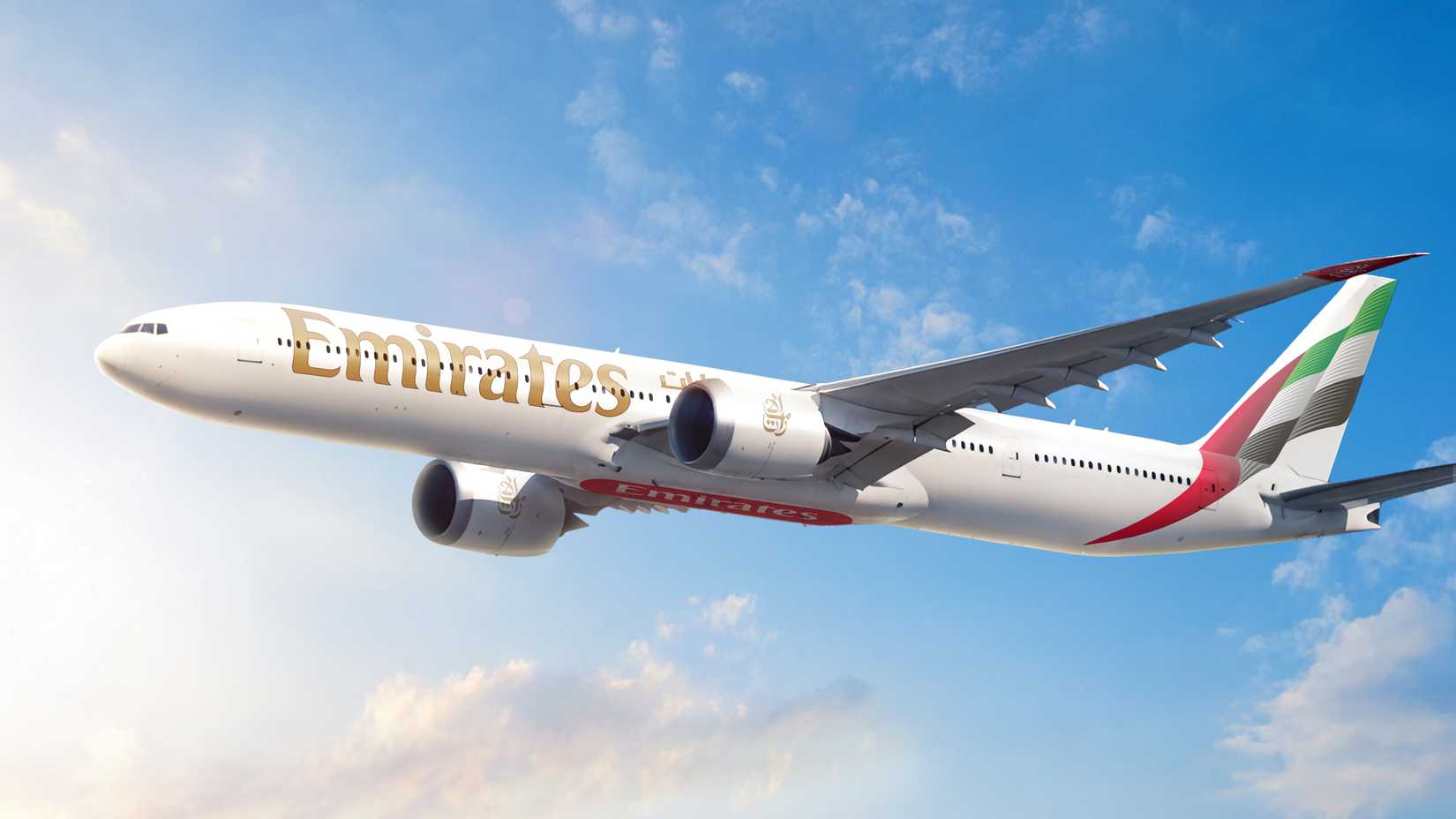 Emirates Boeing 777-9 aircraft livery in blue sky