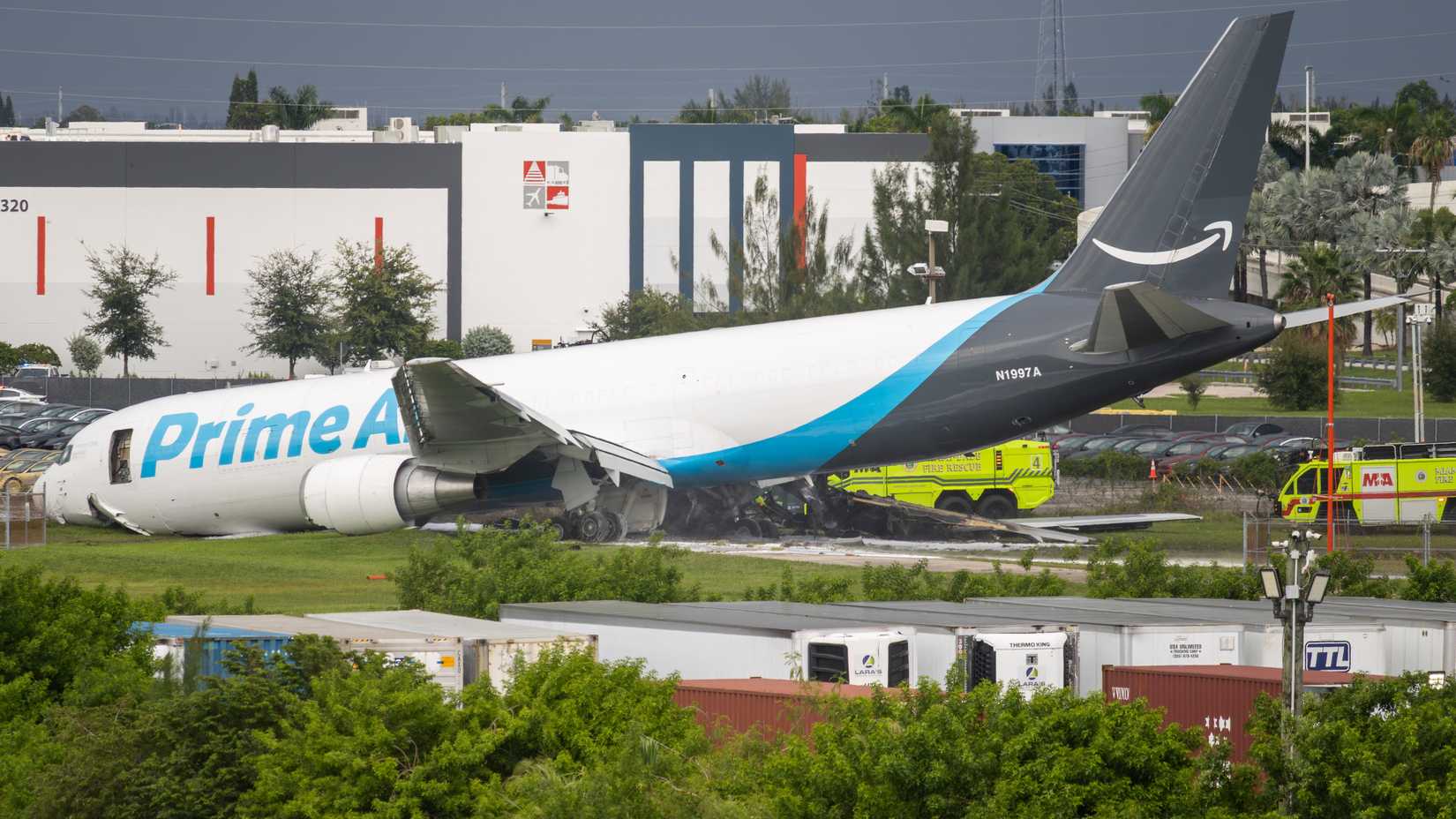 A 21 Air Boeing 767-300(F) freighter (N1997A), operating for Amazon Prime Air, resting off the runway of MIA