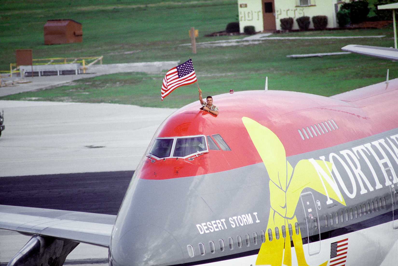 A Boeing 747 jet aircraft arrives on base with troops returning from deployment in the Persian Gulf during Operations Desert Shield, Desert Storm.
