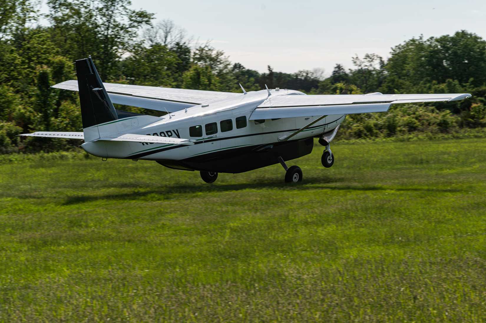 A Cessna C-208B Grand Caravan takes off
