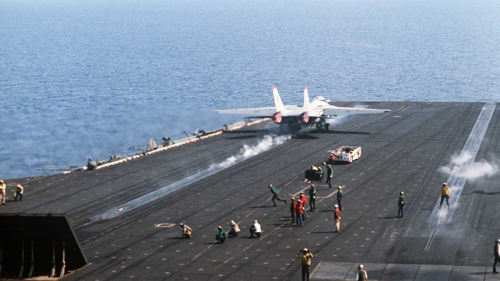 A Fighter Squadron 14 (VF-14) F-14A Tomcat aircraft is launched from the aircraft carrier USS JOHN F. KENNEDY (CV 67) during NATO Exercise DISPLAY DETERMINATION '86