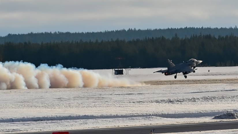 A Swedish Saab JAS 39 Gripen C takes off for an integrated training sortie at Luleå-Kallax Air Base, Sweden