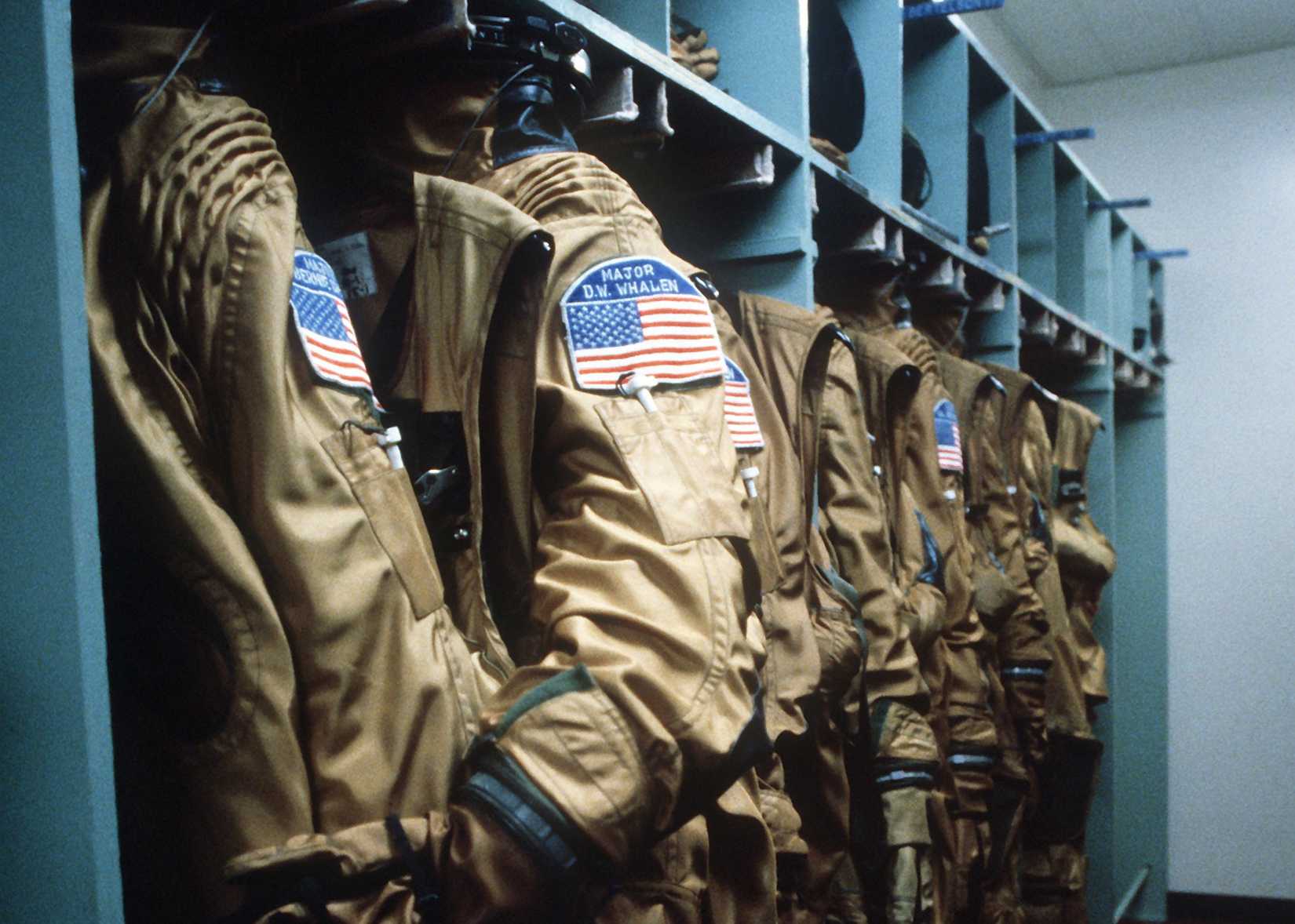 A view of high-pressure suits of SR-71 Blackbird aircraft pilots, hanging in a dressing room