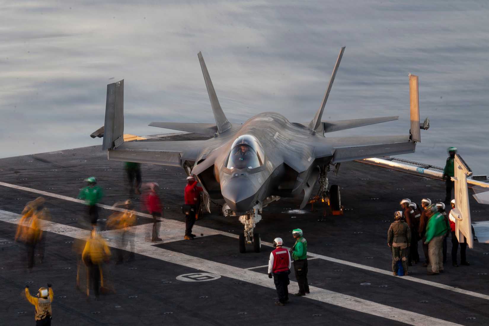 ailors conduct flight operations for an F-35C Lightning II, assigned to Strike Fighter Squadron (VFA) 97, aboard Nimitz-class aircraft carrier USS Carl Vinson