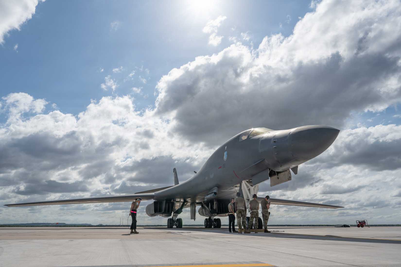 Air Force Airmen from the 7th Maintenance Group prepare a B-1B Lancer for departure