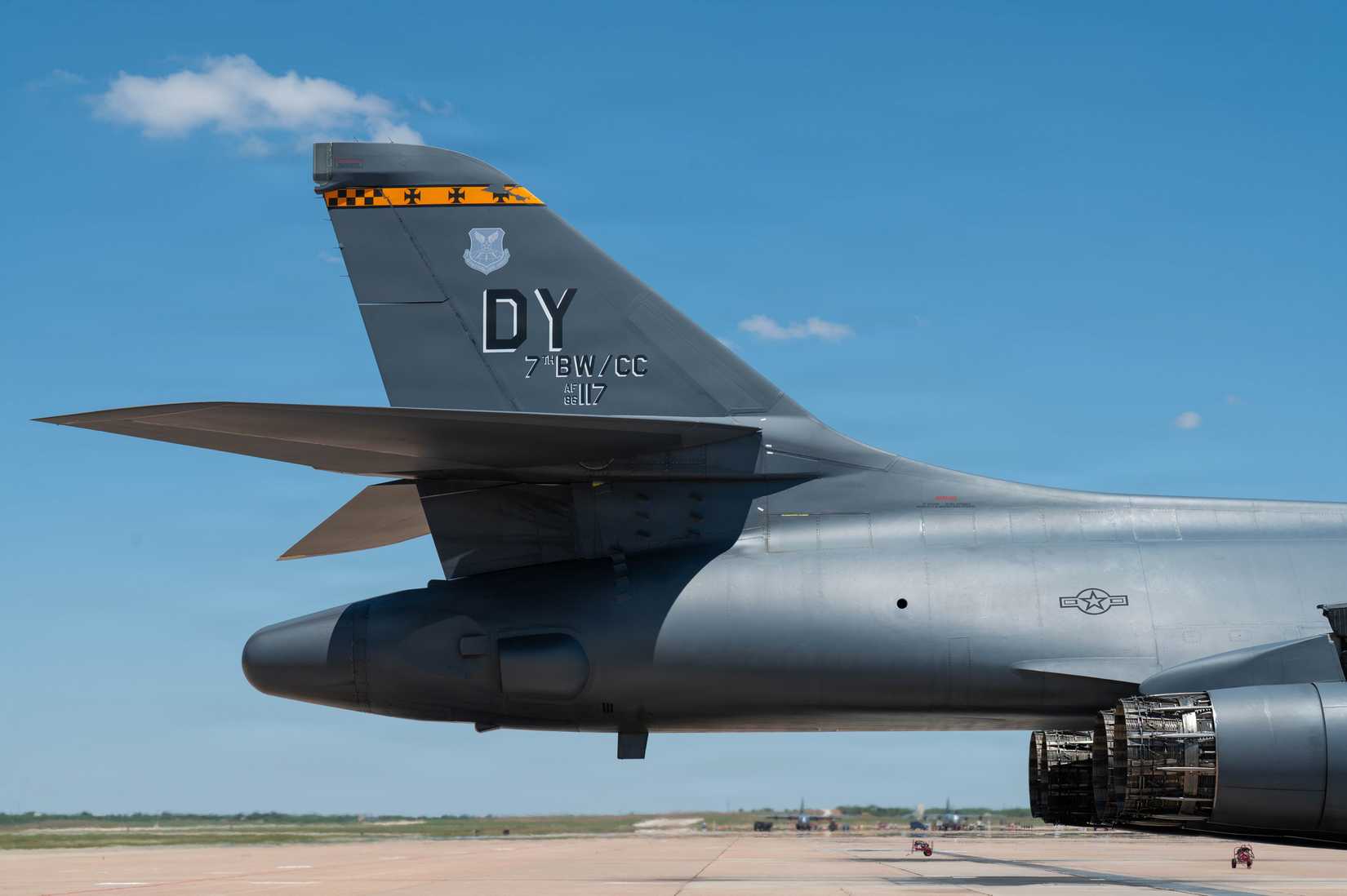 Air Force B-1B Lancer assigned to the 7th Bomb Wing, 86-0117, sits on the flightline following its return to Dyess Air Force Base, Texas