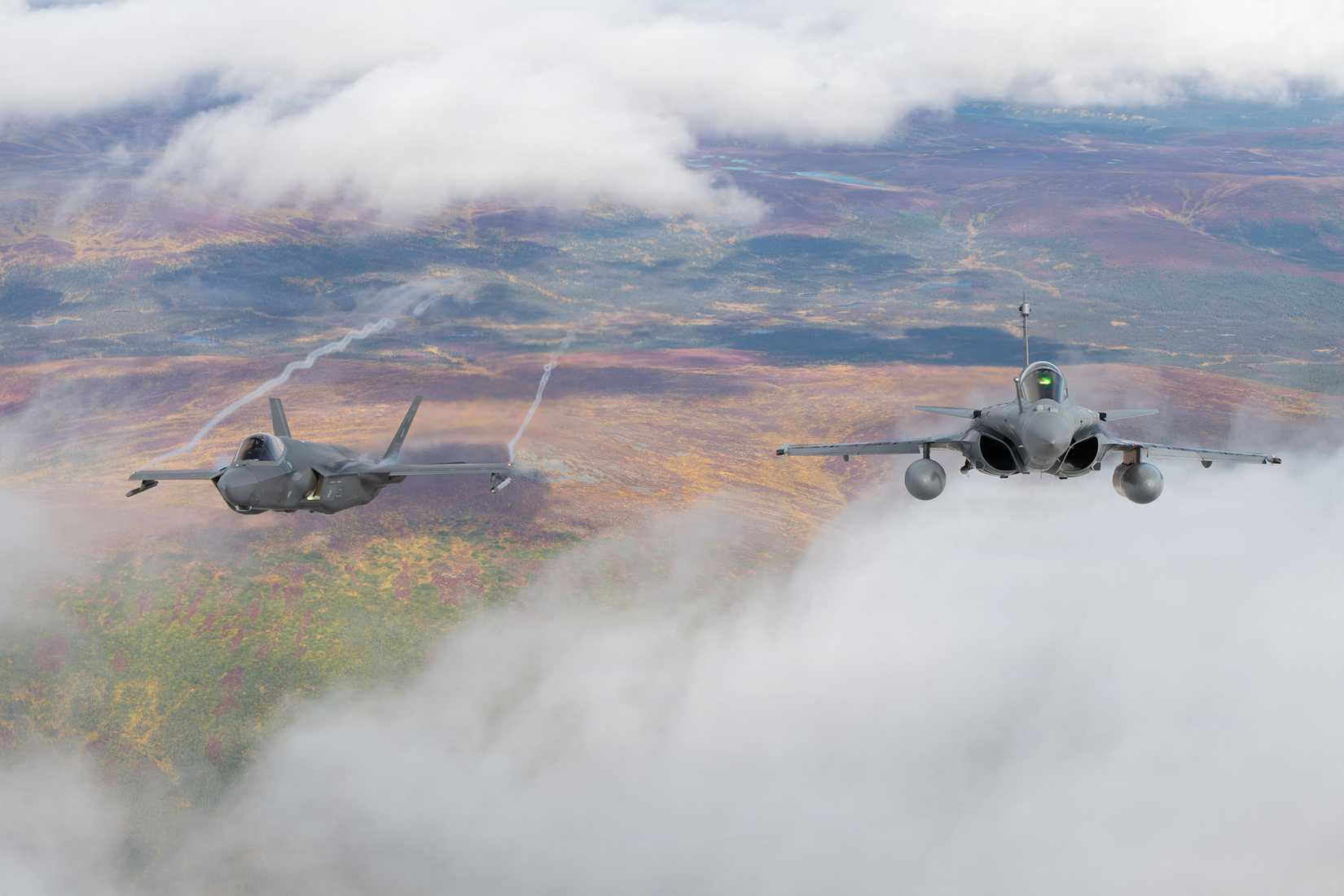 Air Force F-35A Lightning II assigned to the 355th Fighter Squadron, left, and a French Air and Space Force Dassault Rafale F4