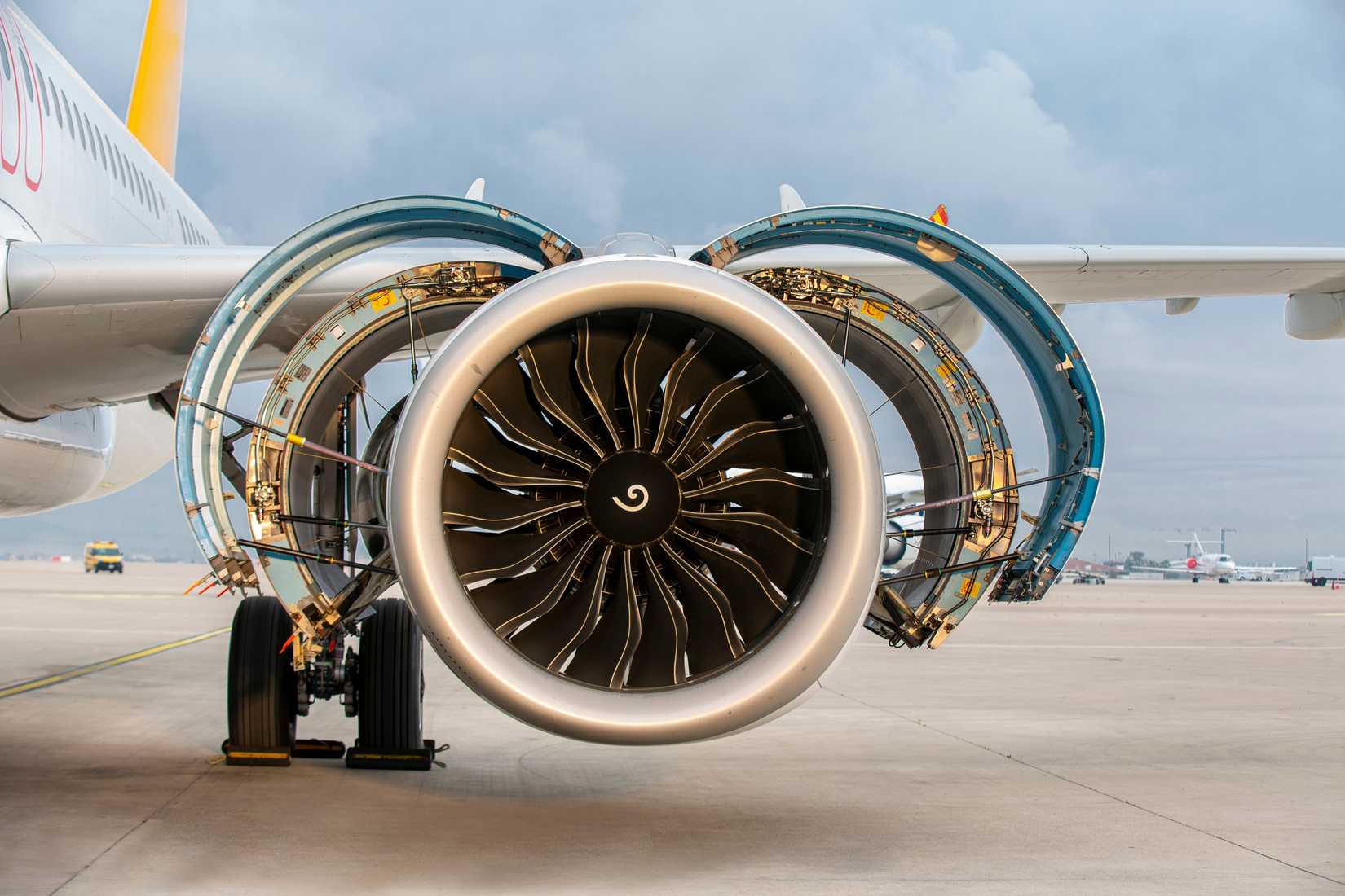 Aircraft jet engine open and on the tarmac