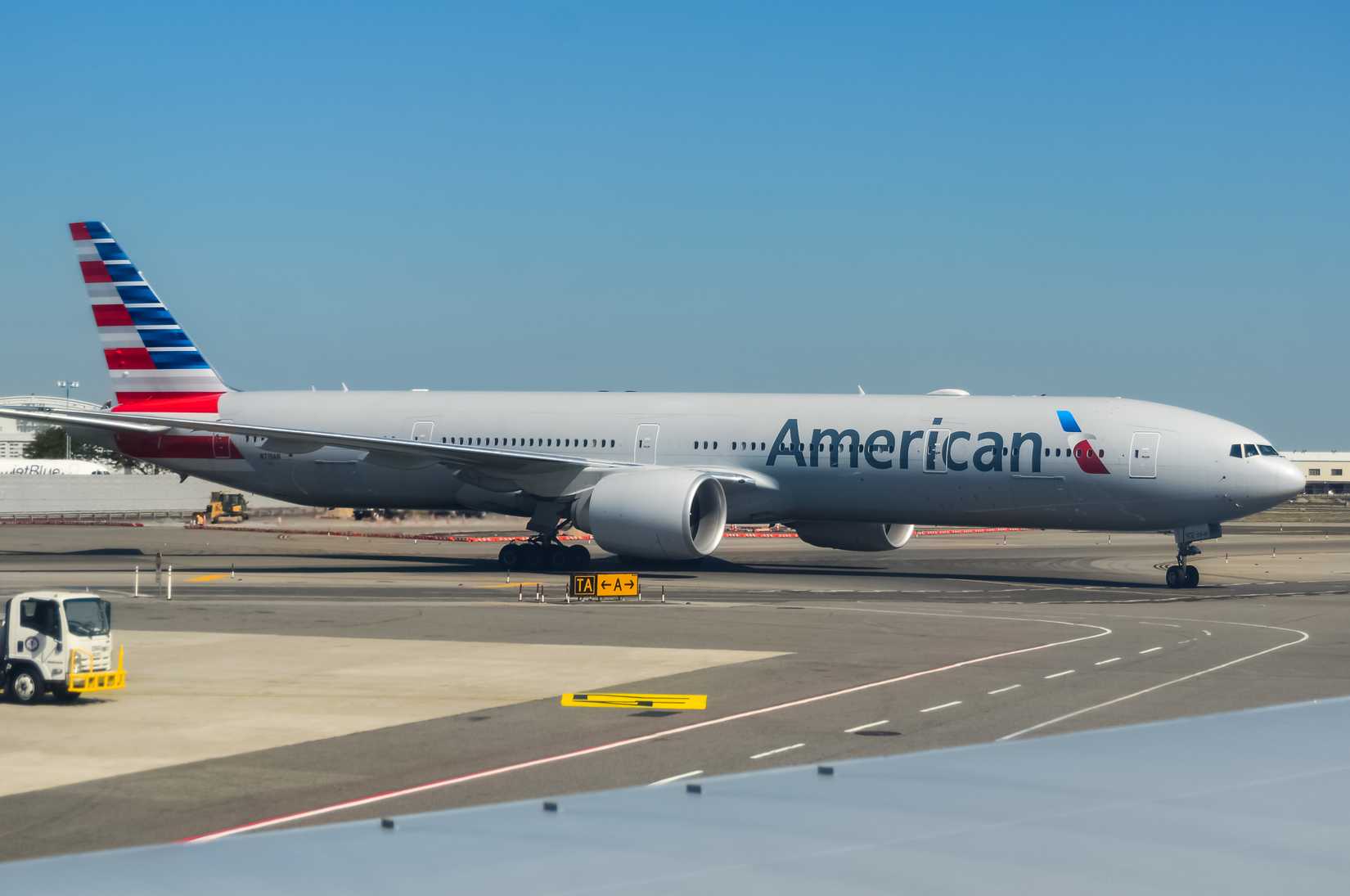 American Airlines Boeing 777-300ER taxing at the John F. Kennedy International Airport in New York