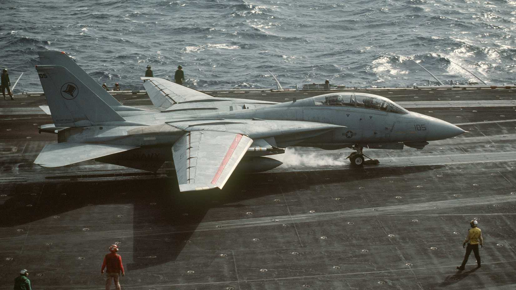 An F-14A Tomcat aircraft from Fighter Squadron 14 (VF-14) is launched from the aircraft carrier USS JOHN F. KENNEDY (CV 67)