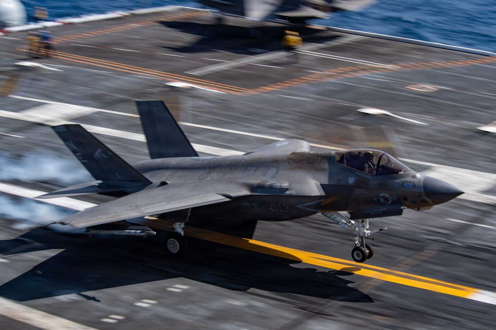 An F-35C Lightning II, assigned to the War Hawks of Strike Fighter Squadron (VFA) 97, lands on the flight deck Nimitz-class aircraft carrier USS Carl Vinson