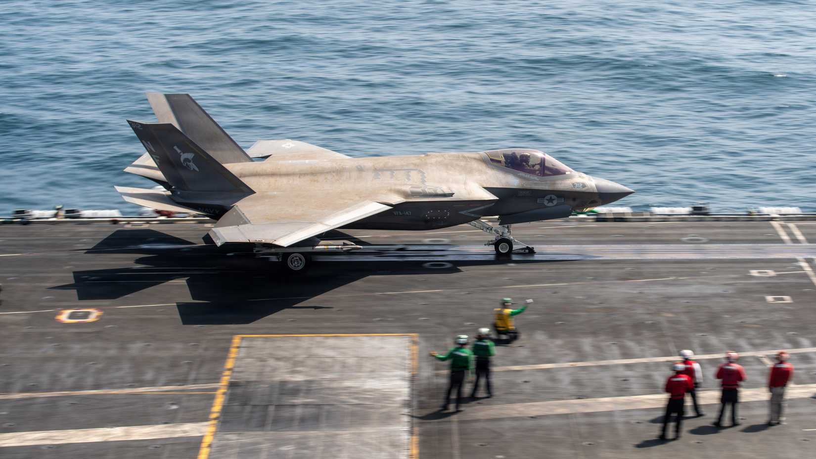 An F-35C Lightning II, attached to Strike Fighter Squadron (VFA) 147, launches from Nimitz-class aircraft carrier USS George Washington