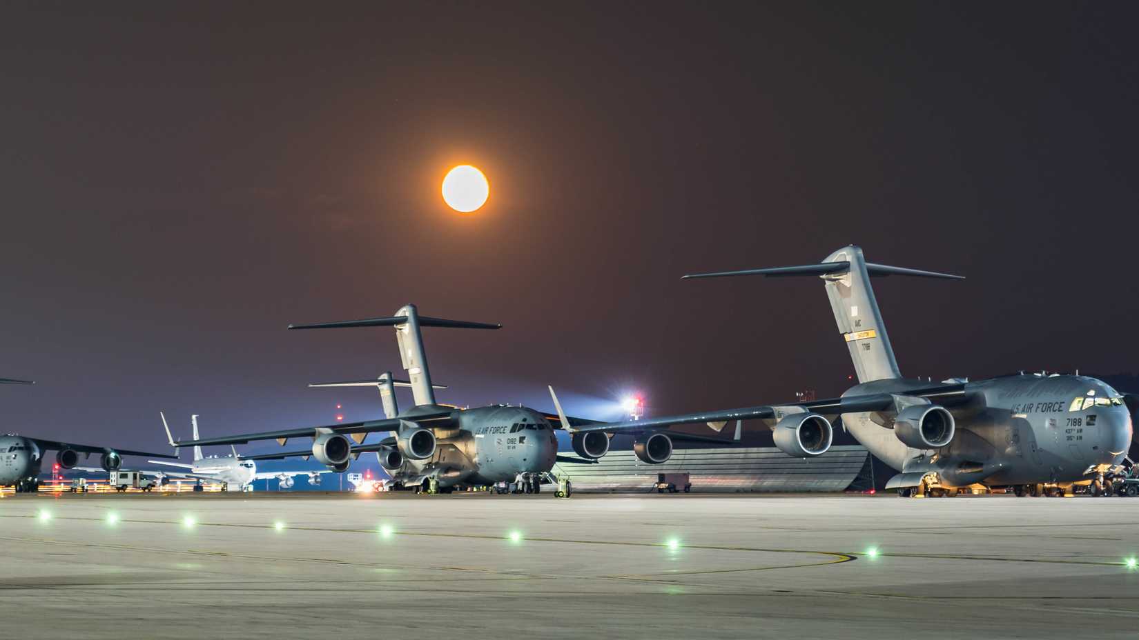 C-17 Globemaster III aircraft prepare to depart Ramstein Air Base, Germany