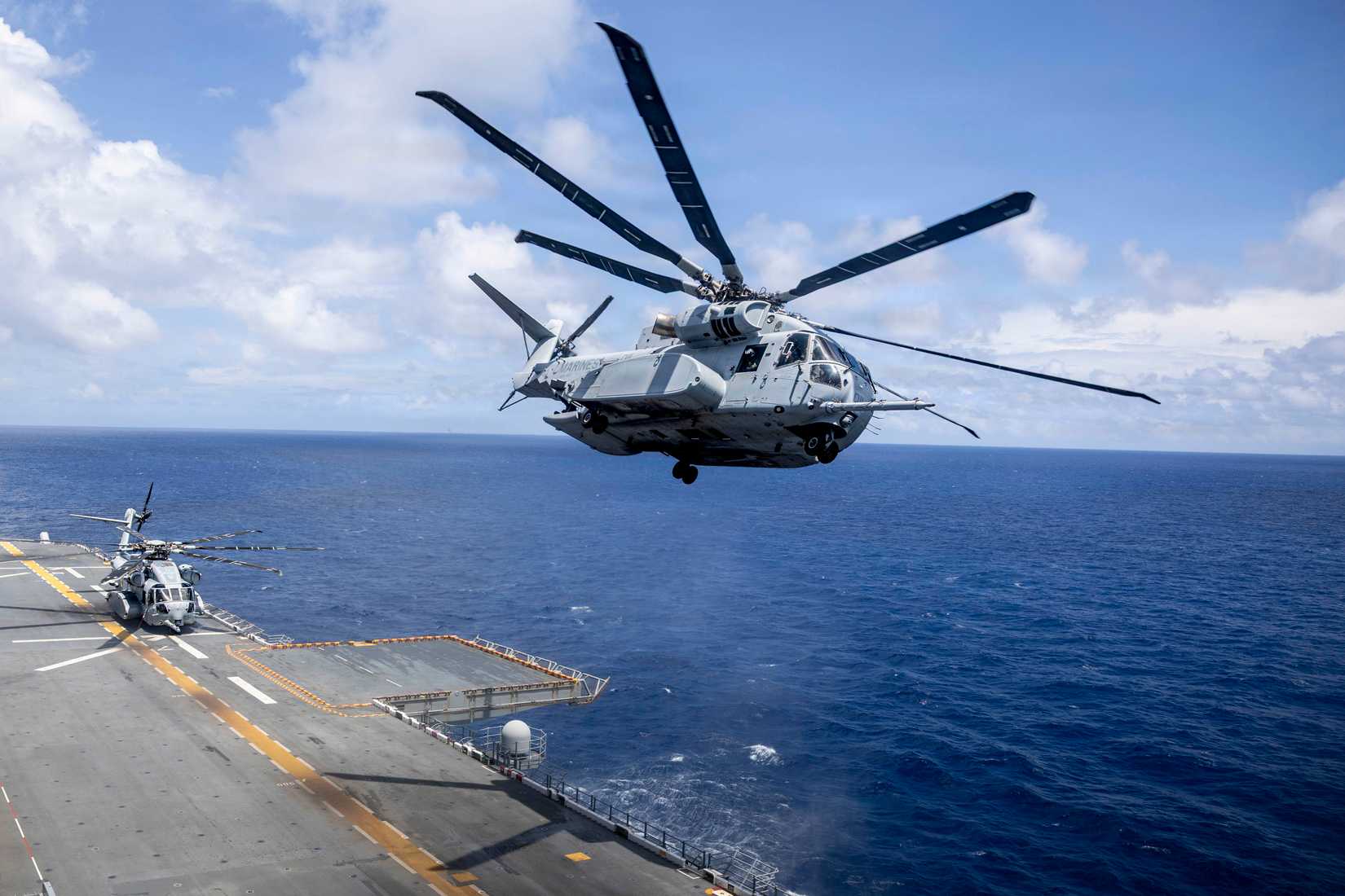 CH-53K King Stallion, assigned to Marine Heavy Helicopter Squadron (HMH) 461, departs the flight deck of Wasp-class amphibious assault ship USS Kearsarge