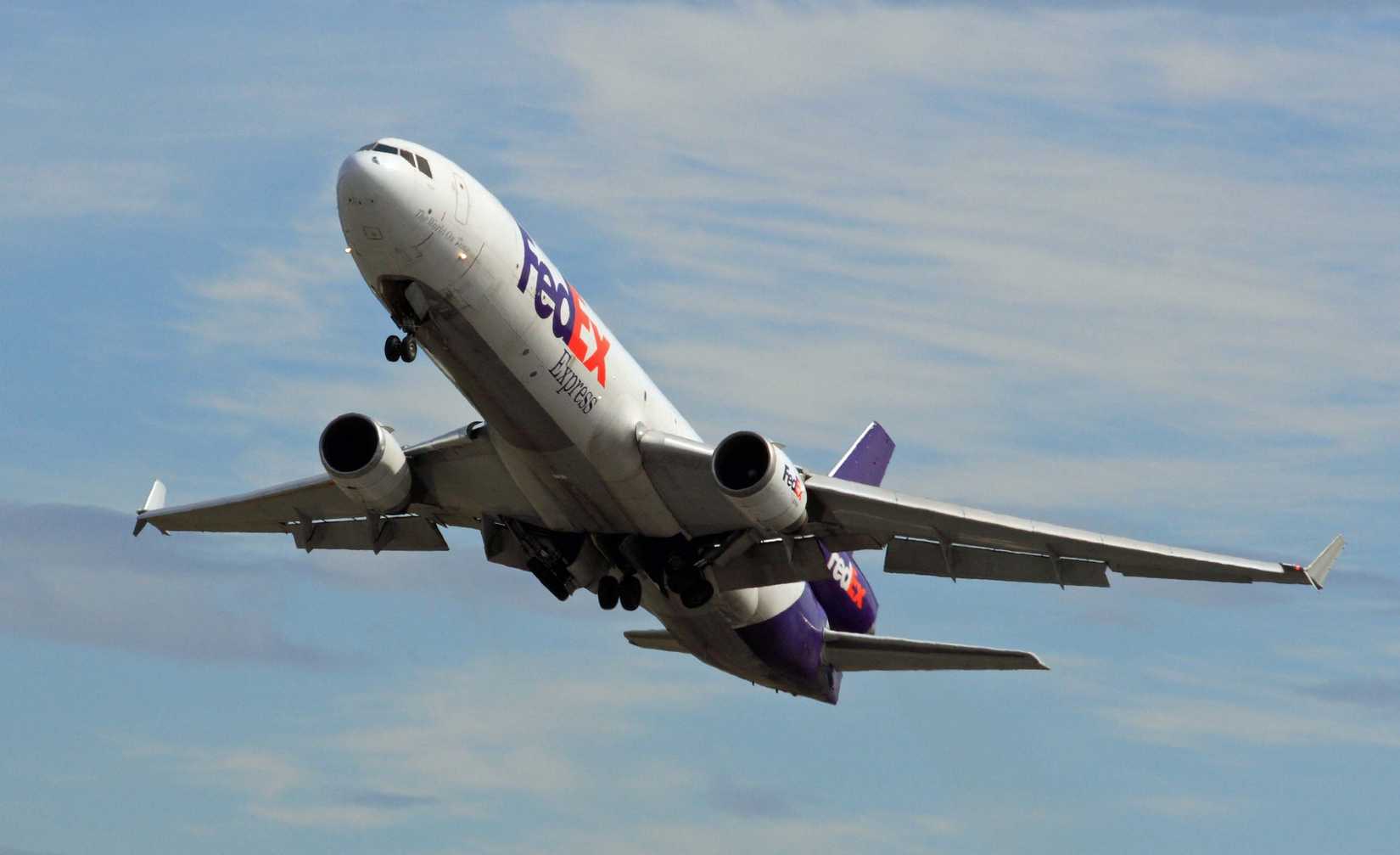 FedEx_MD-11_leaving_ANC_(6479964219)