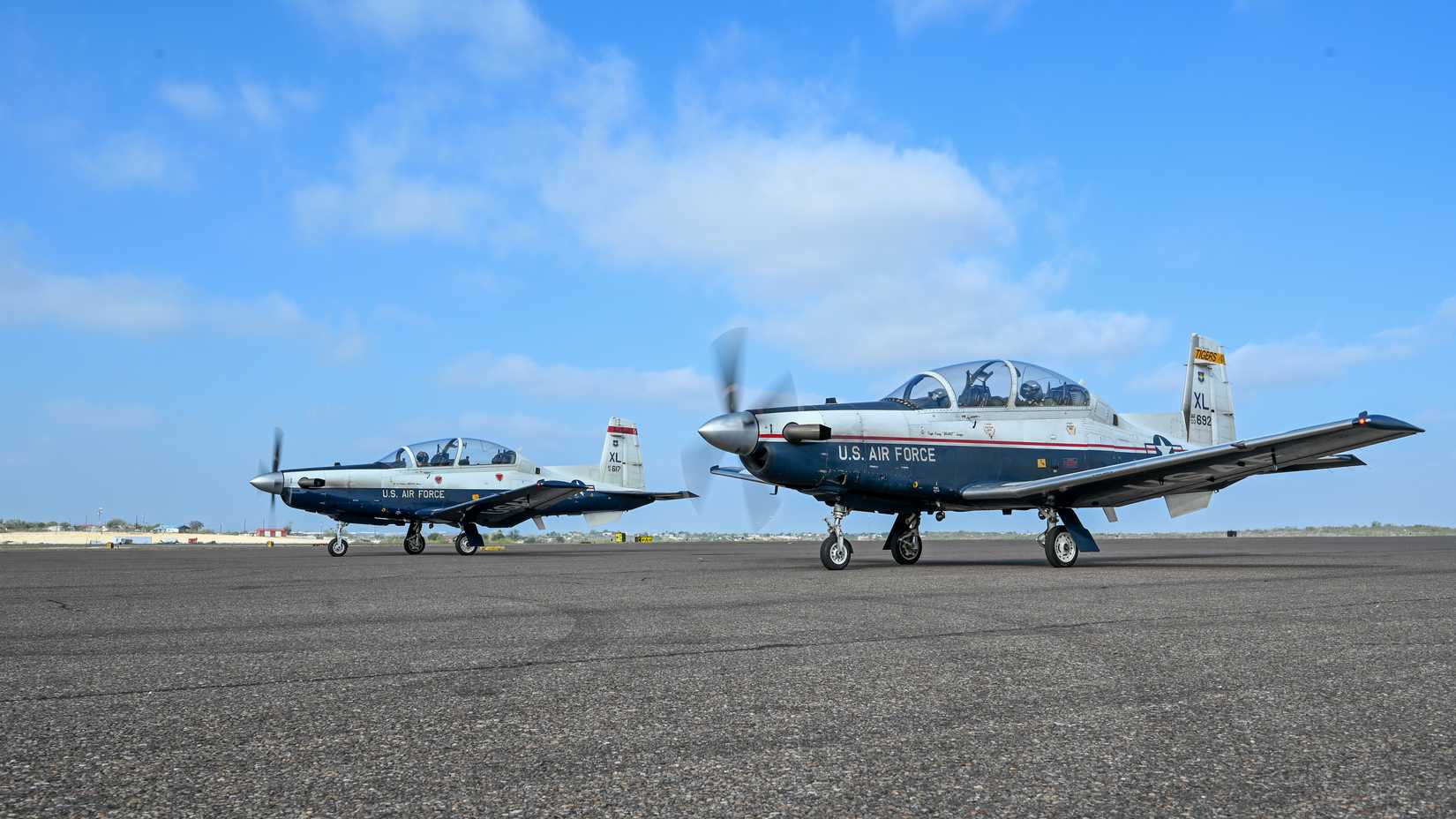 Four T-6A Texan II’s assigned to the 47th Flying Training Wing taxi on the flight line at Del Rio International Airport