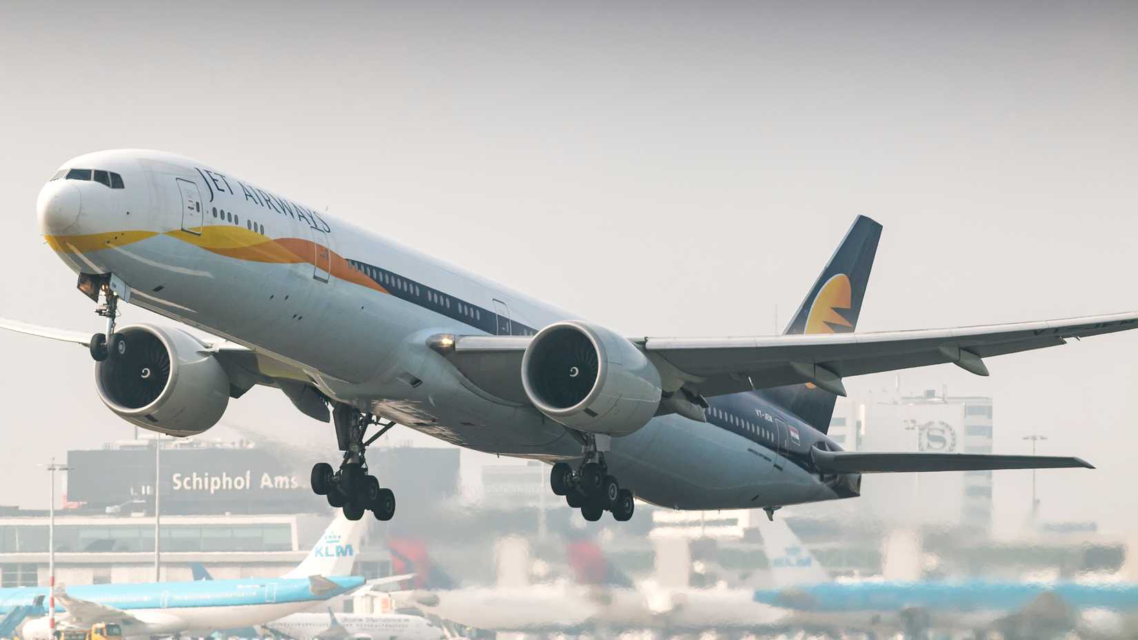 Jet Airways Boeing 777-300ER leaving Amsterdam Airport 