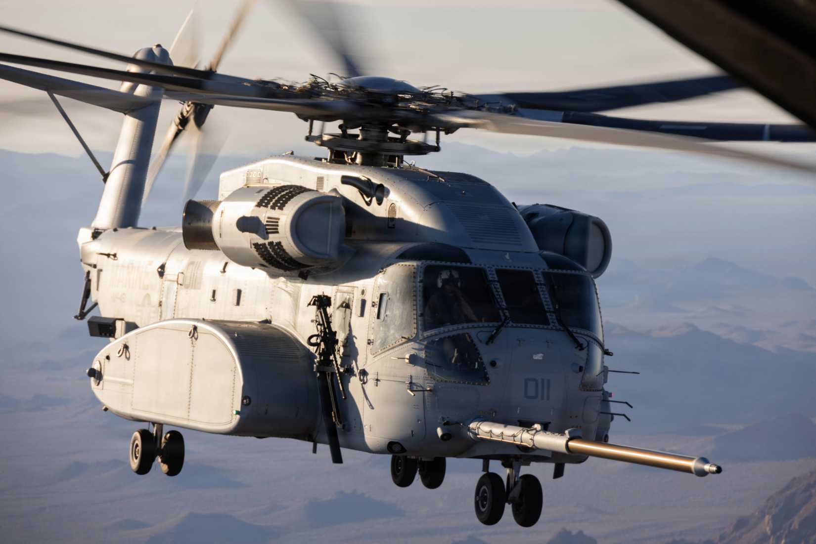 Marine Corps CH-53K King Stallion assigned to Marine Aviation Weapons and Tactics Squadron One (MAWTS-1), conducts an air-to-air refueling during a CH-53 long range raid exercise