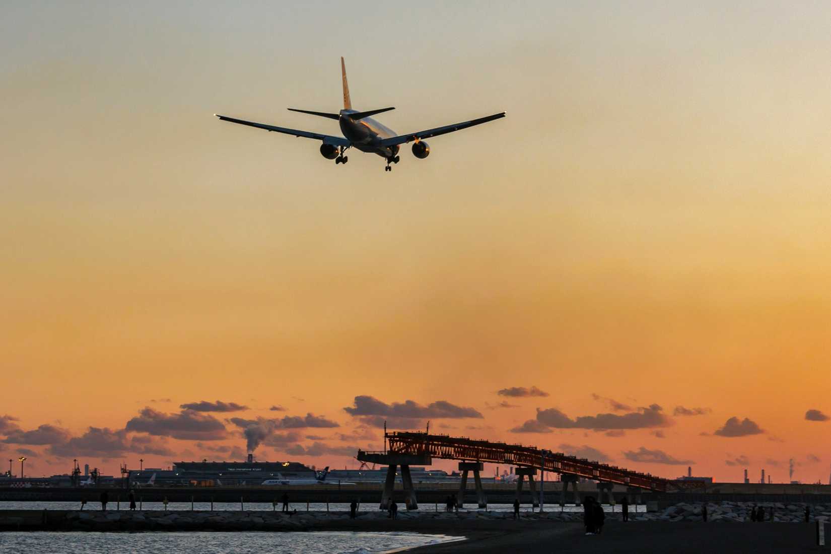 Aircraft landing at an airport at twilight