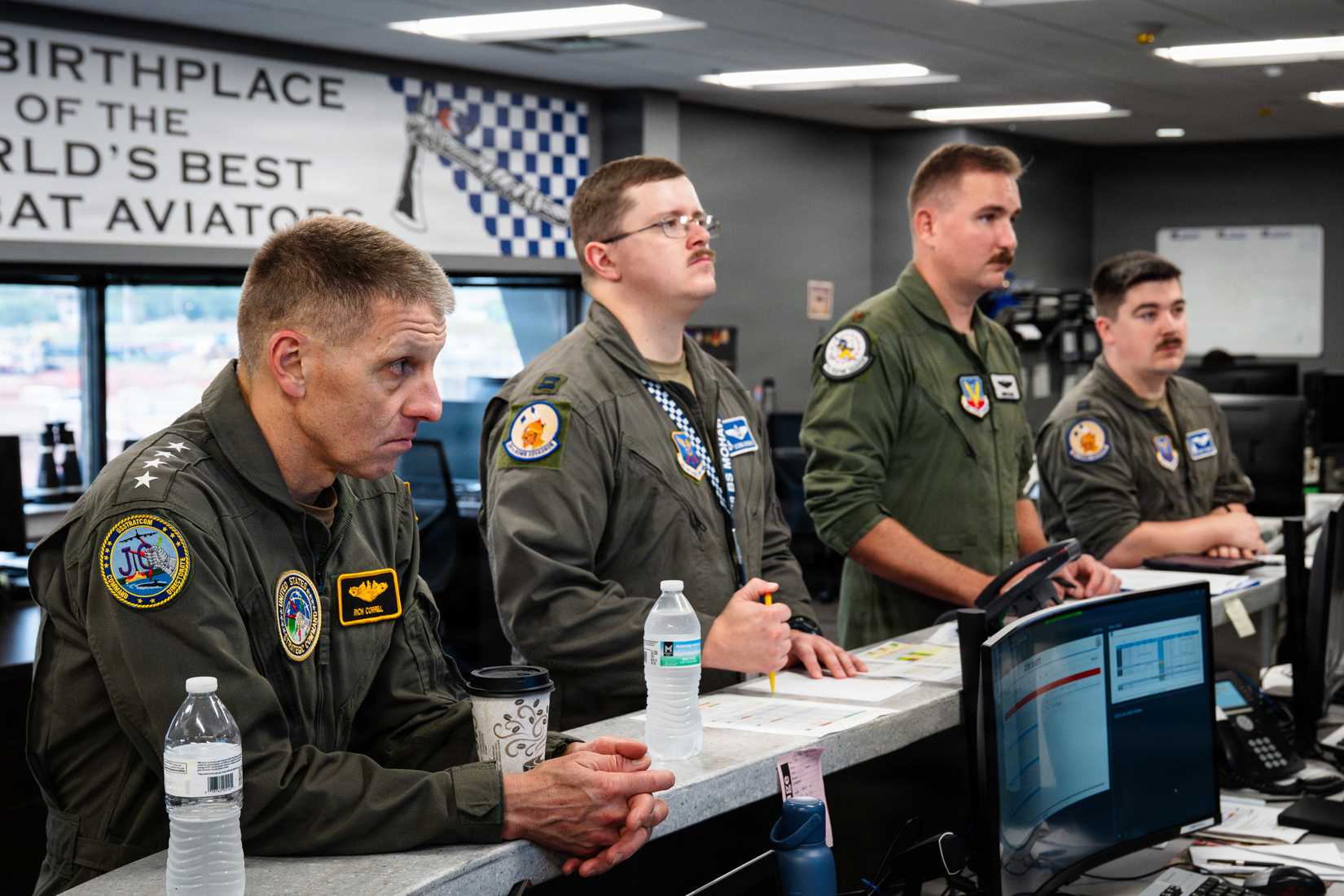 Navy Adm. Rich Correll, commander, U.S. Strategic Command, attends a B-1B Lancer mission briefing with the 28th Bomb Squadron