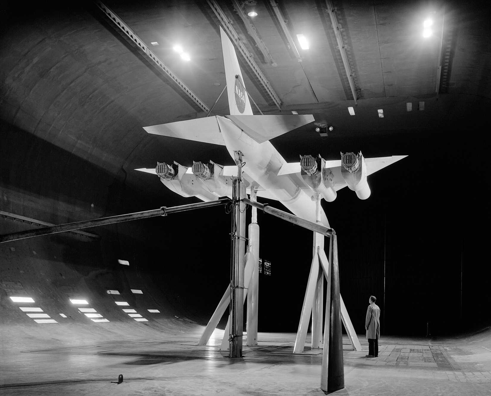 3/4 rear view of SCAT-17 supersonic transport with thrust reverser installed and trailing edge flaps deflected at 30 deg.