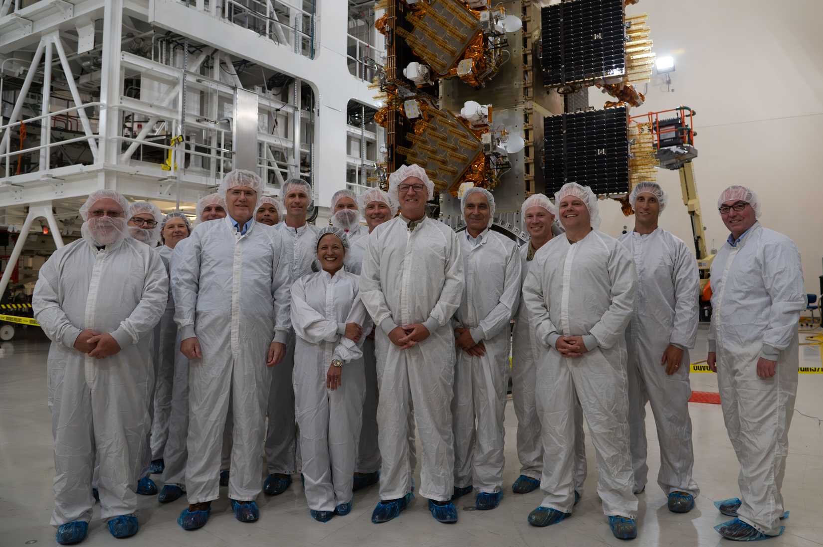 Secretary of the Air Force Troy Meink along with Senator Kevin Cramer (R-N.D.) pose with Vandenberg SFB leadership in front of the Space Development Agency’s Tranche 1 satellites