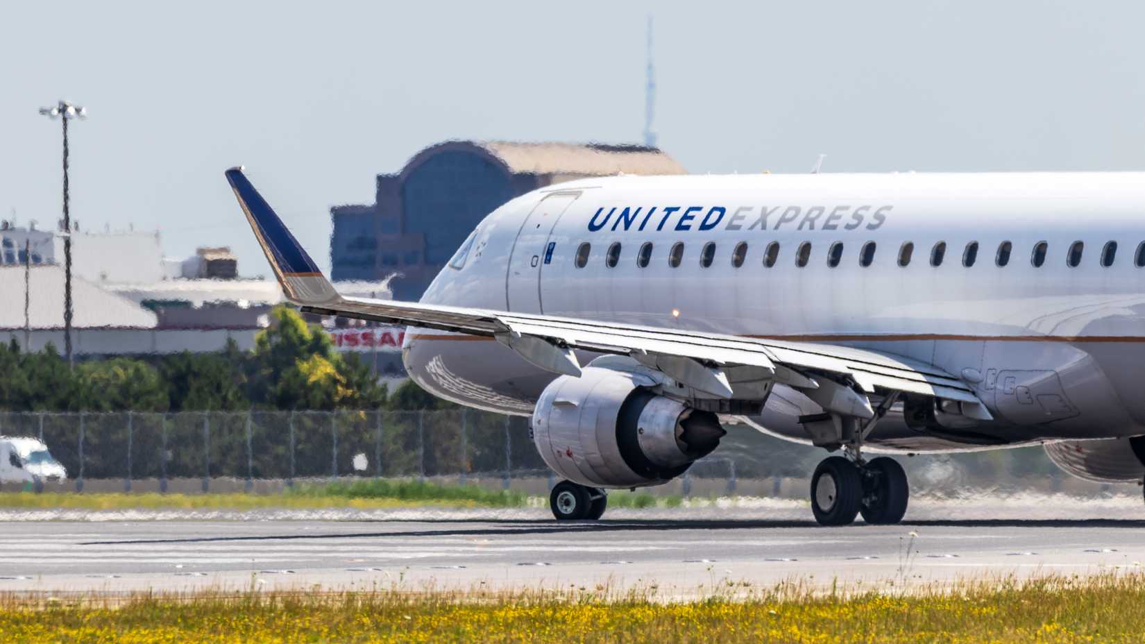 Close up of United Airlines Express Embraer 170 aircraft 