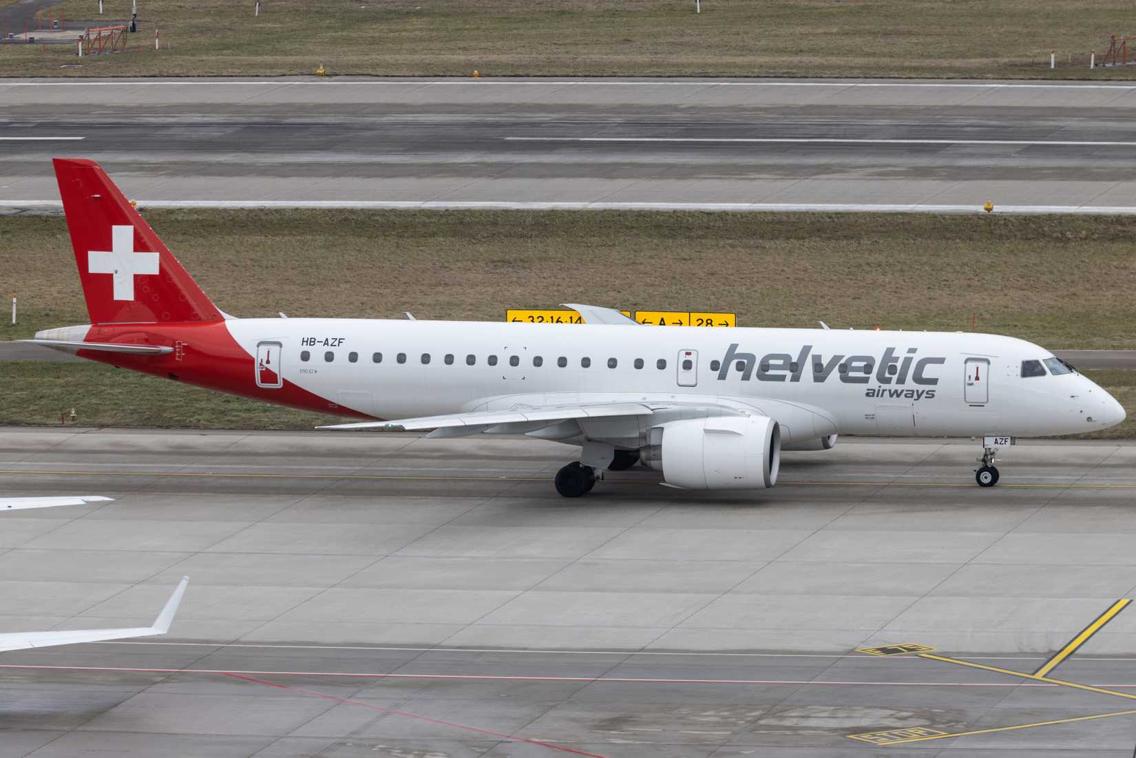 ZÃ¼rich, Swiss - January 18, 2022 - Helvetic Airways (2L | OAW) at Flughafen ZÃ¼rich (LSZH|ZRH) with a Embraer E190-E2 E290 (HB-AZF | 19020043).
