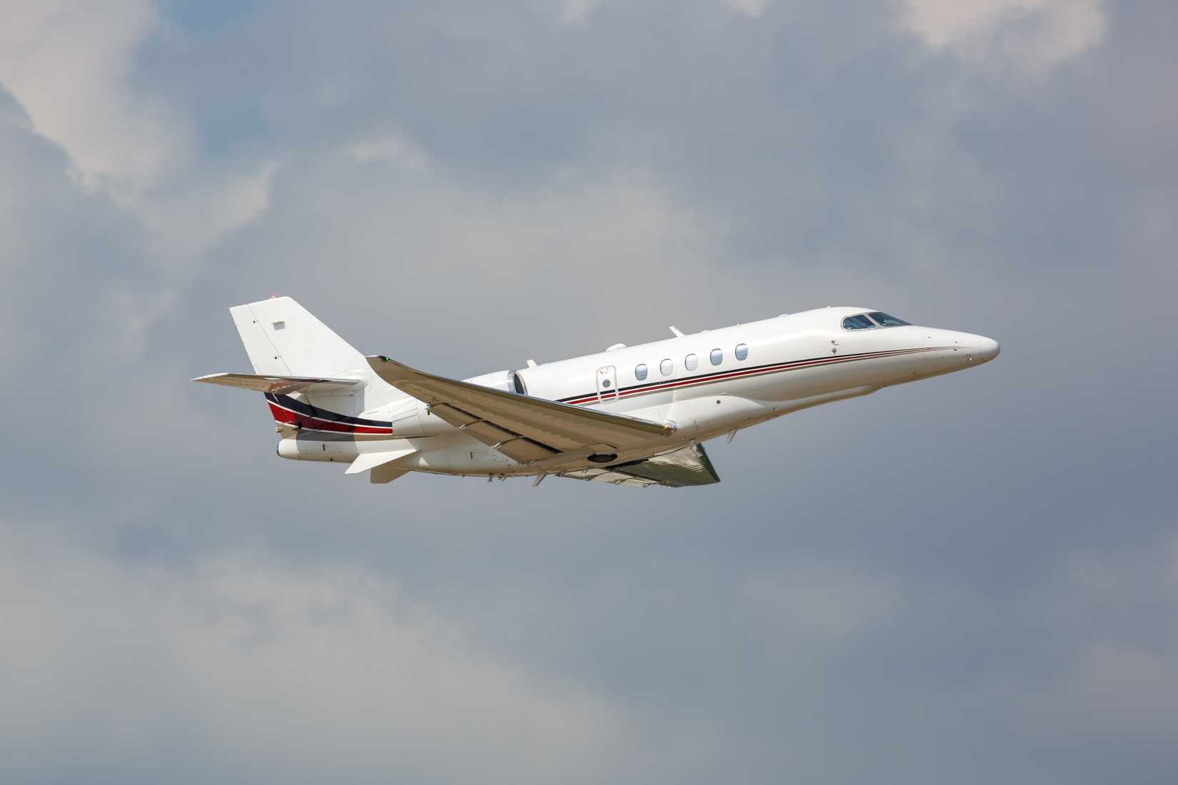NetJets Cessna Citation Climbing