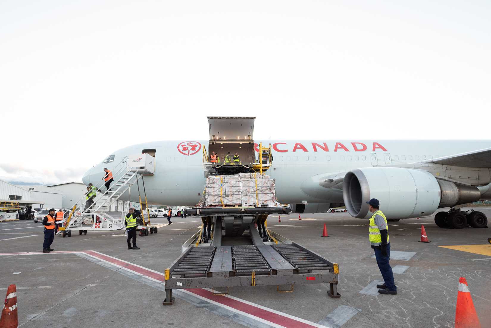 05 19 2023 - Alajuela, Costa Rica.  Air Canada's Cargo operations loading a Boeing 767 BSF full of pineapple and other fruits from  SJO -Juan Santamaria International Airport 