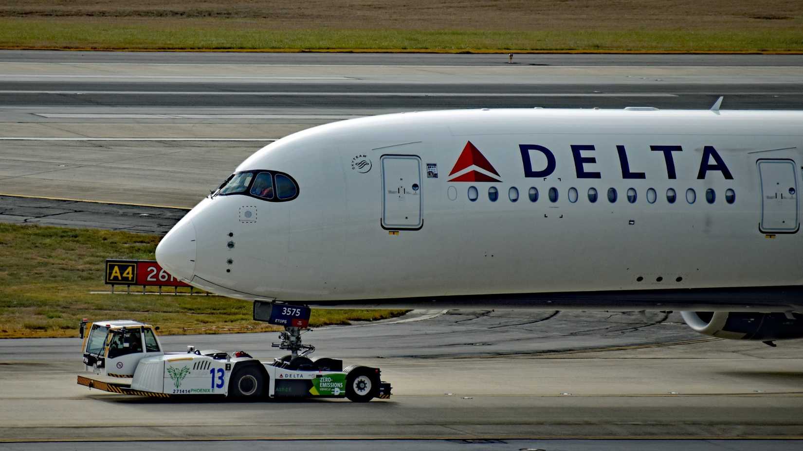 Close up of Delta Air Lines Airbus A350-900 aircraft being towed 