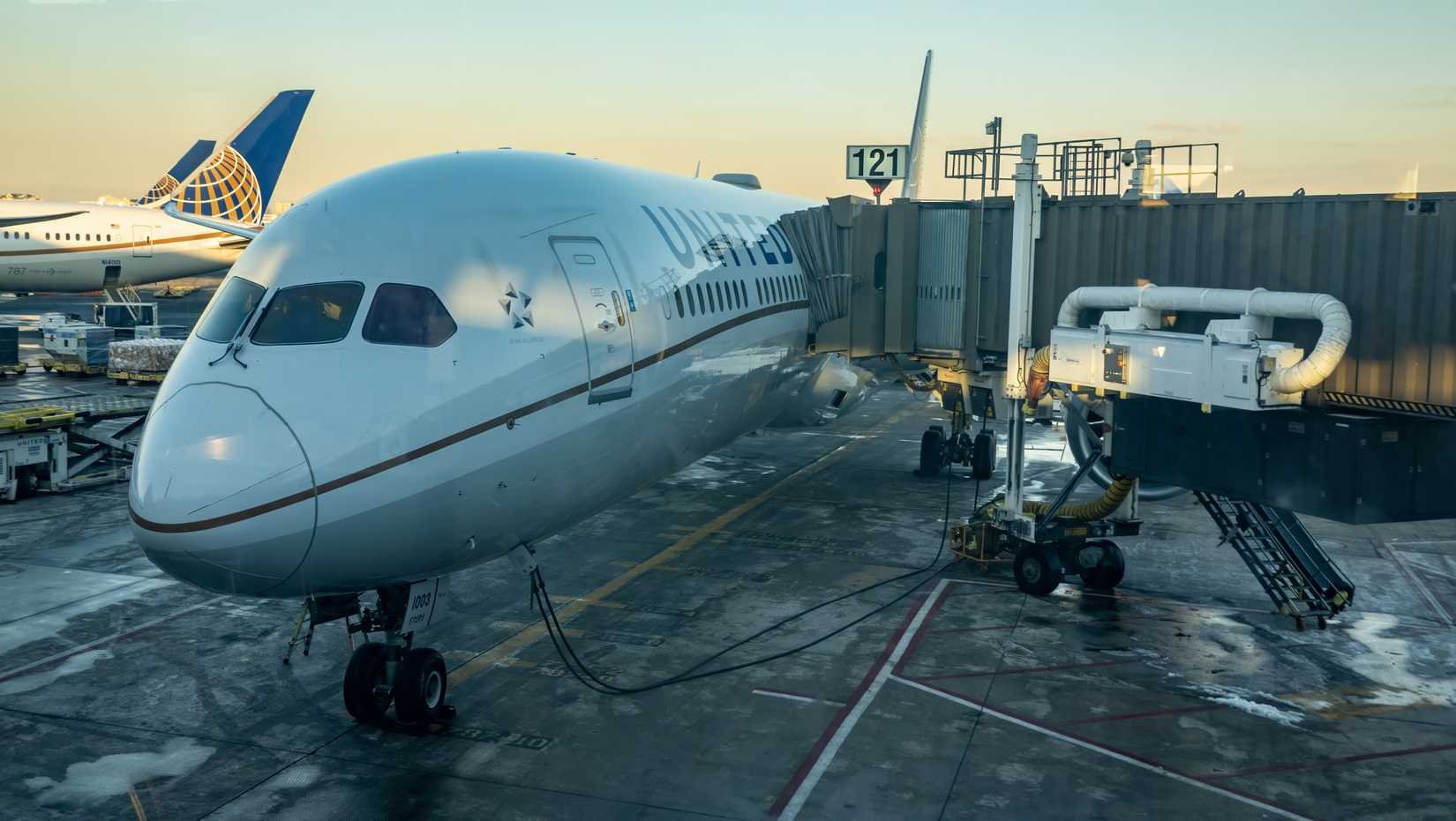 Airliner from United Airlines, docked at a gate at Newark Liberty International Airport