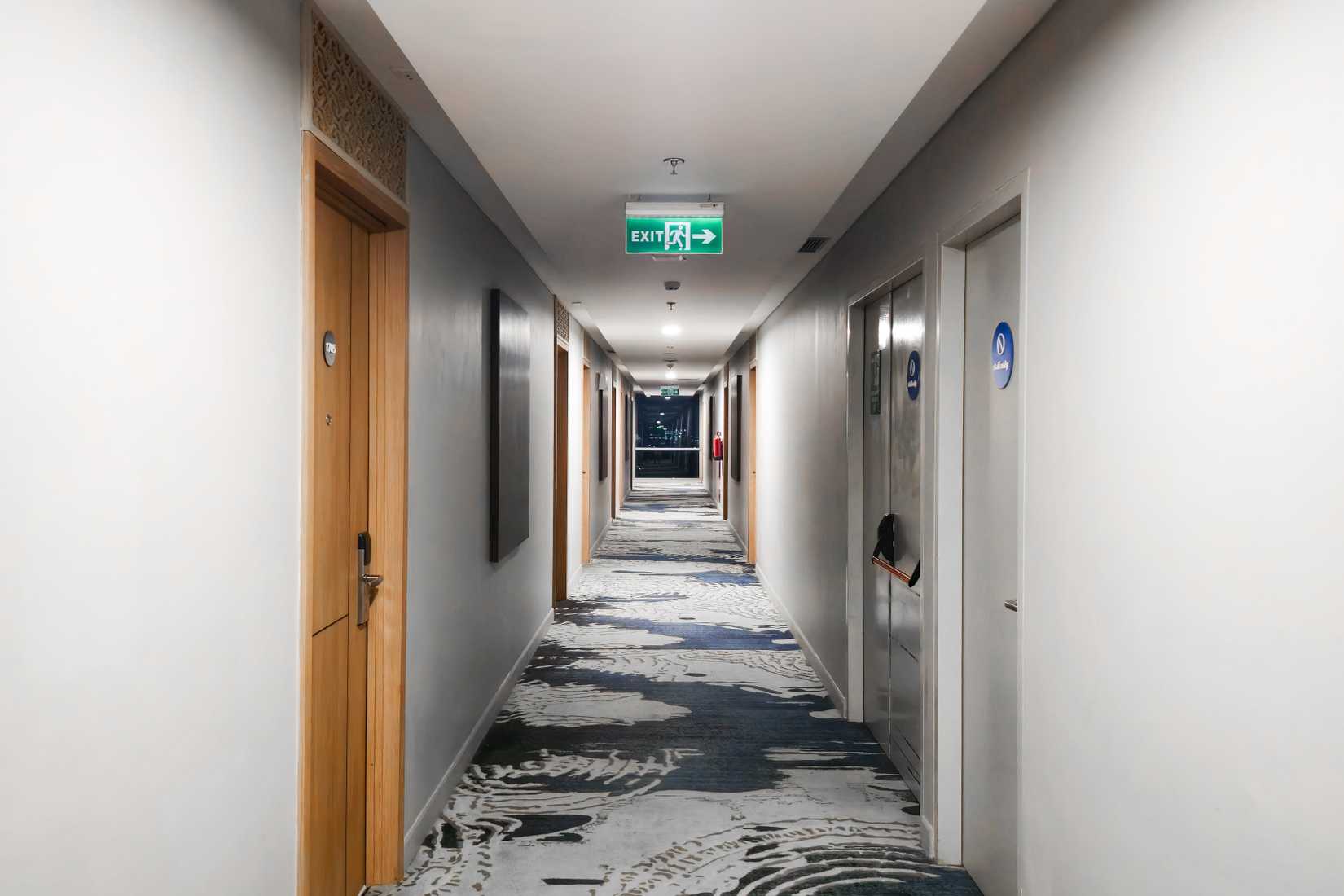 hotel corridor and fire exit sign