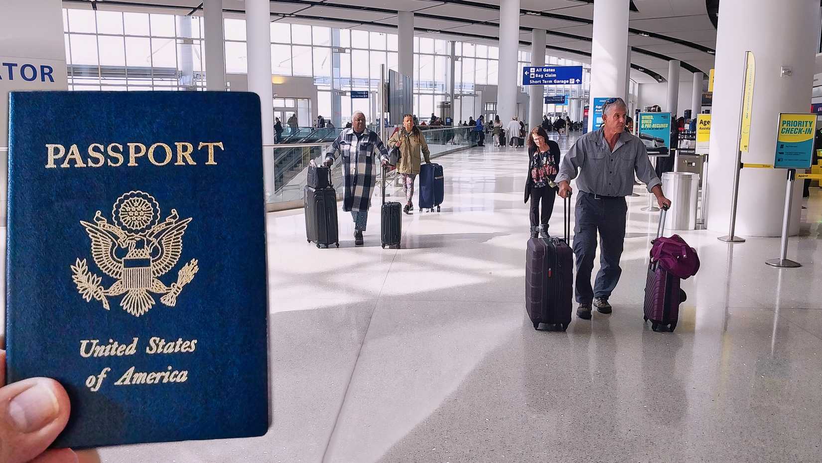 New Orleans - February 13, 2025:  Selective focus on United States Passport held inside airport terminal