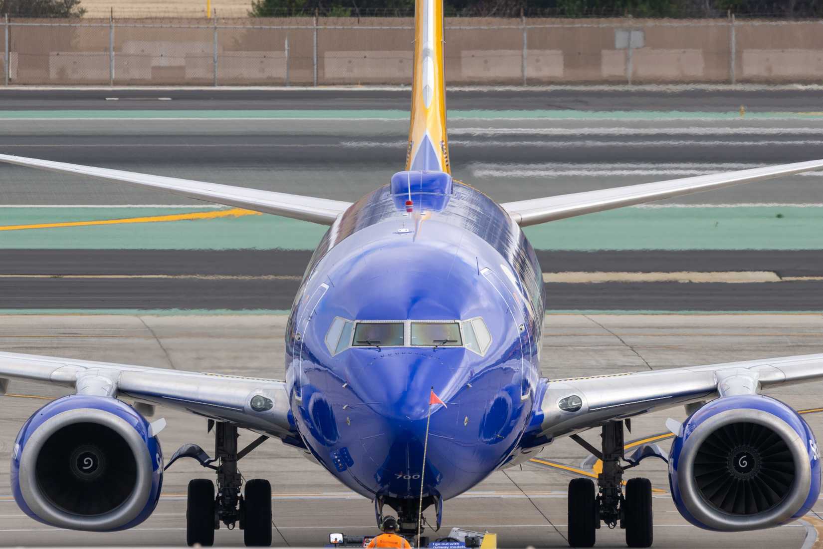 San Diego, California, USA — September 19, 2025: Southwest Airlines Boeing 737-700 (N246LV) head-on on the ramp at SAN