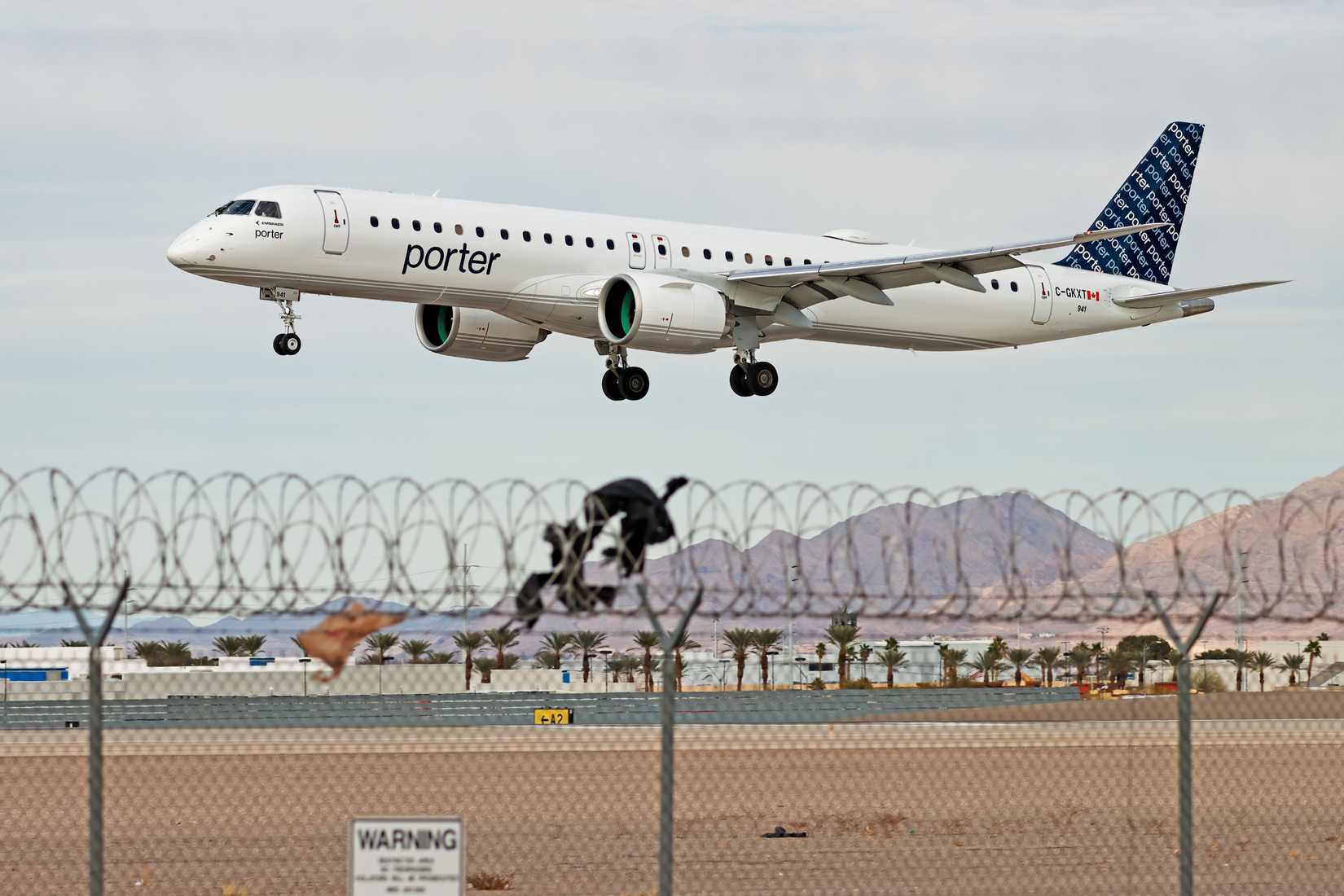 Las Vegas, NV, USA - Feb 19, 2025 : This Embraer E195-E2 type code E295 is Operation by Porter(Porter Airlines Canada). The registration number is C-GKXT. Landing at Las Vegas Harry Reid International Airport(LAS).
