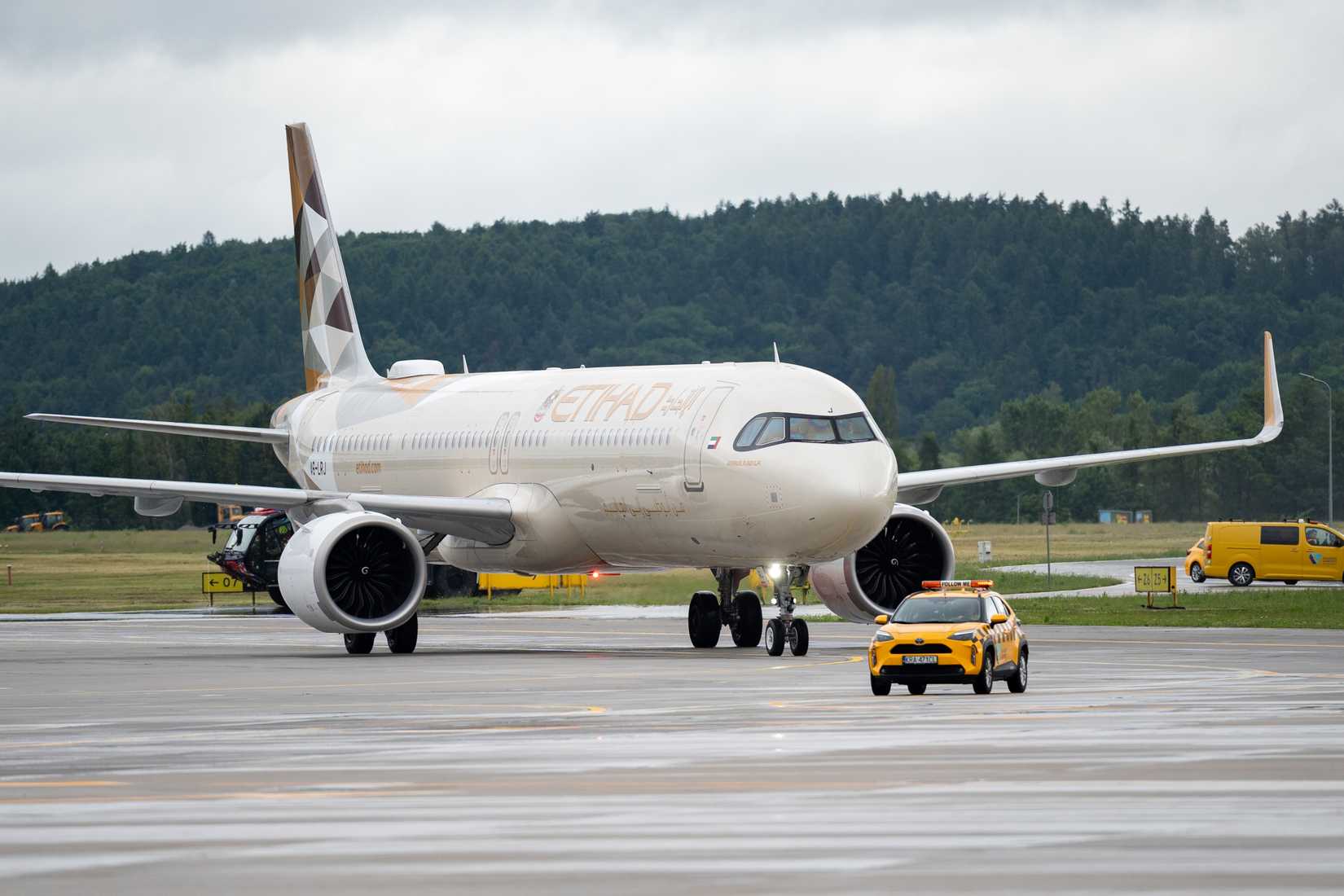Krakow, Poland - June 11, 2026: Etihad Airways Airbus A321LR airplane at John Paul II International Kraków Balice Airport near Cracow. United Arab Emirates carrier, airline plane taxiing on a tarmac.