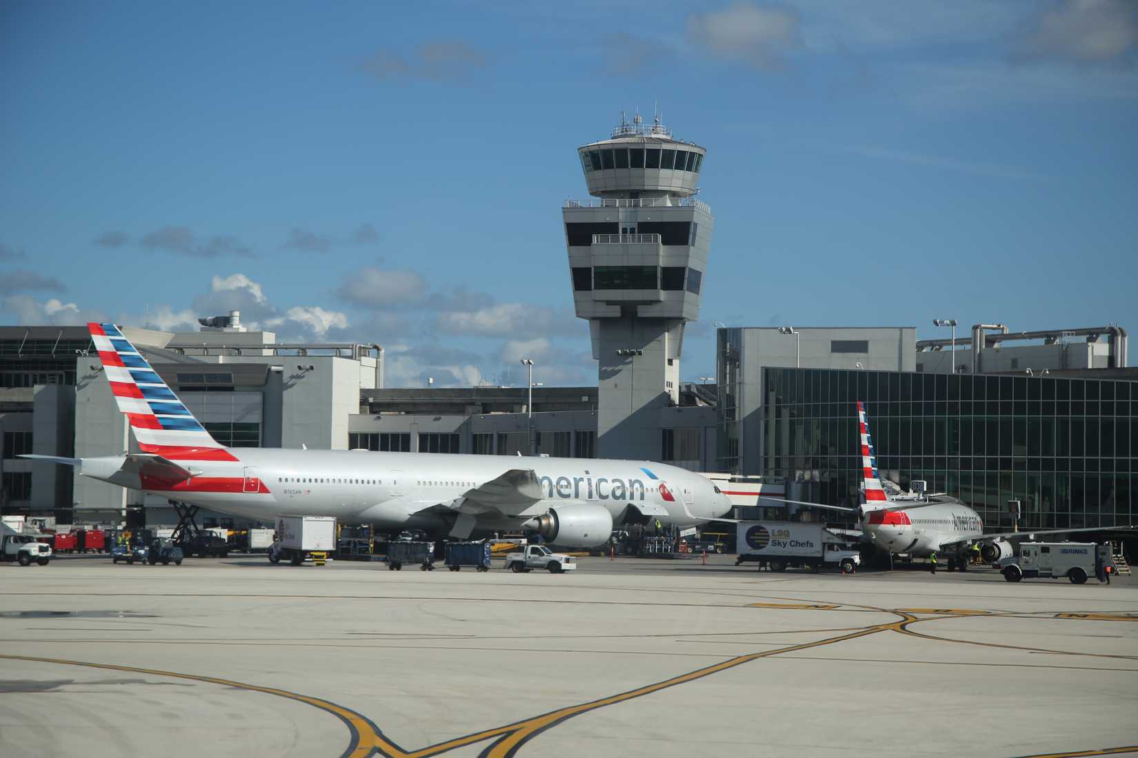 American Airlines plane and Air Traffic Control Tower at Miami International Airport