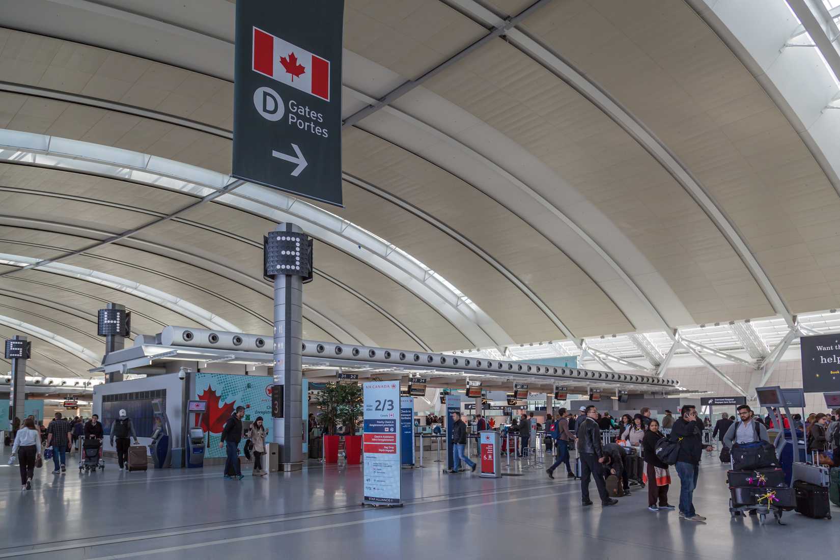 Passengers at Air Canada check in area in Toronto Pearson Airport
