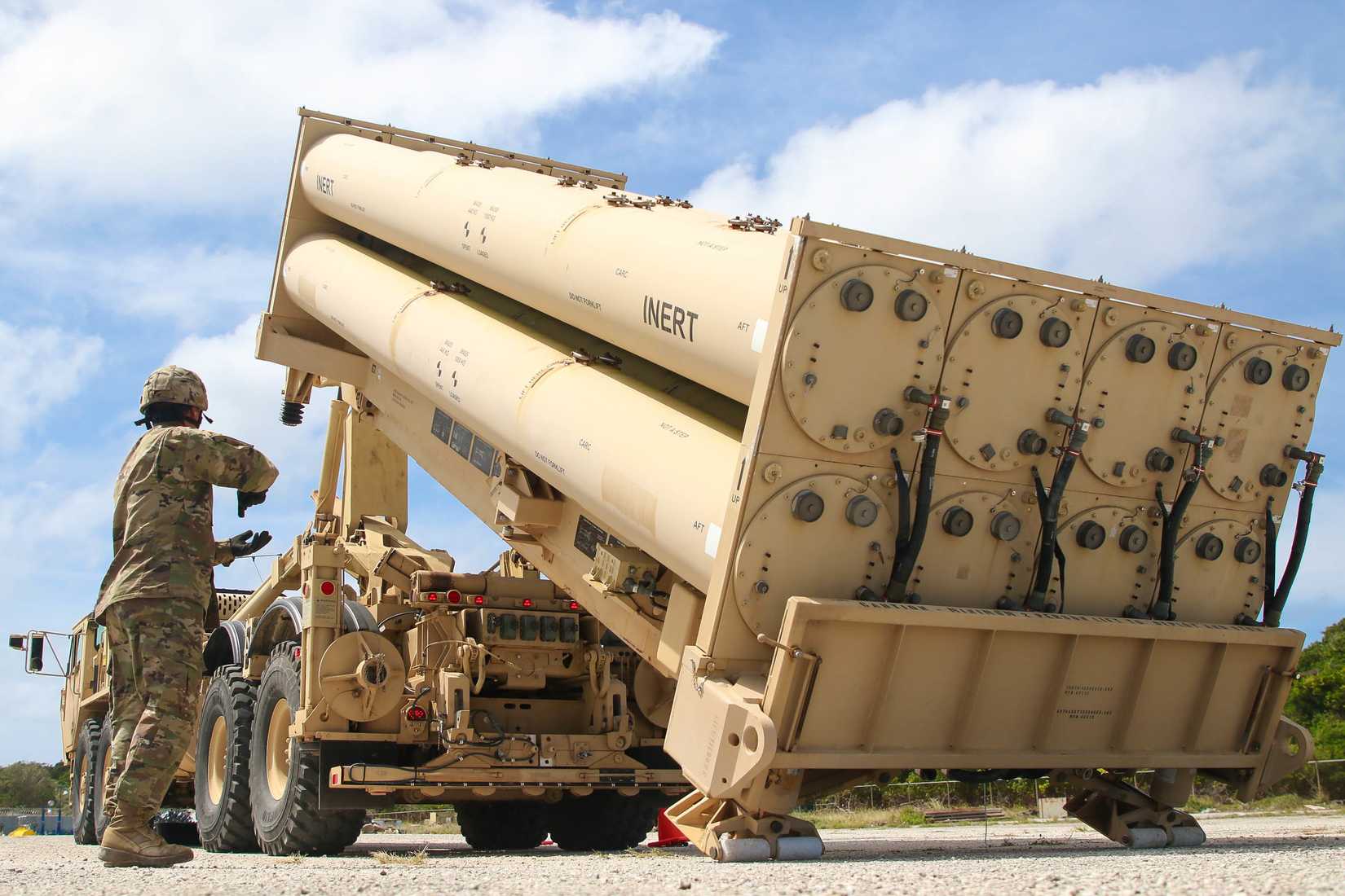 Task Force Talon, 94th Army Air and Missile Defense Command gives commands, during a practice missile reload and unload drills on a Terminal High Altitude Area Defense (THAAD) system trainer at Andersen Air Force Base