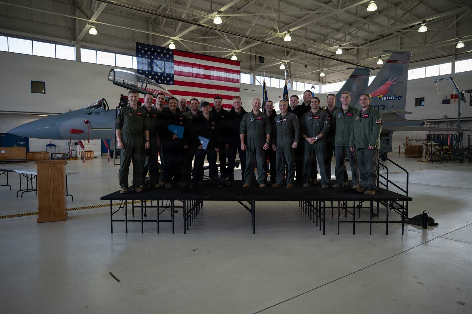 The 142nd Aircraft Maintenance Squadron’s nine Dedicated Crew Chiefs (DCC) and the pilots of the 123rd Fighter Squadron pose for a photo