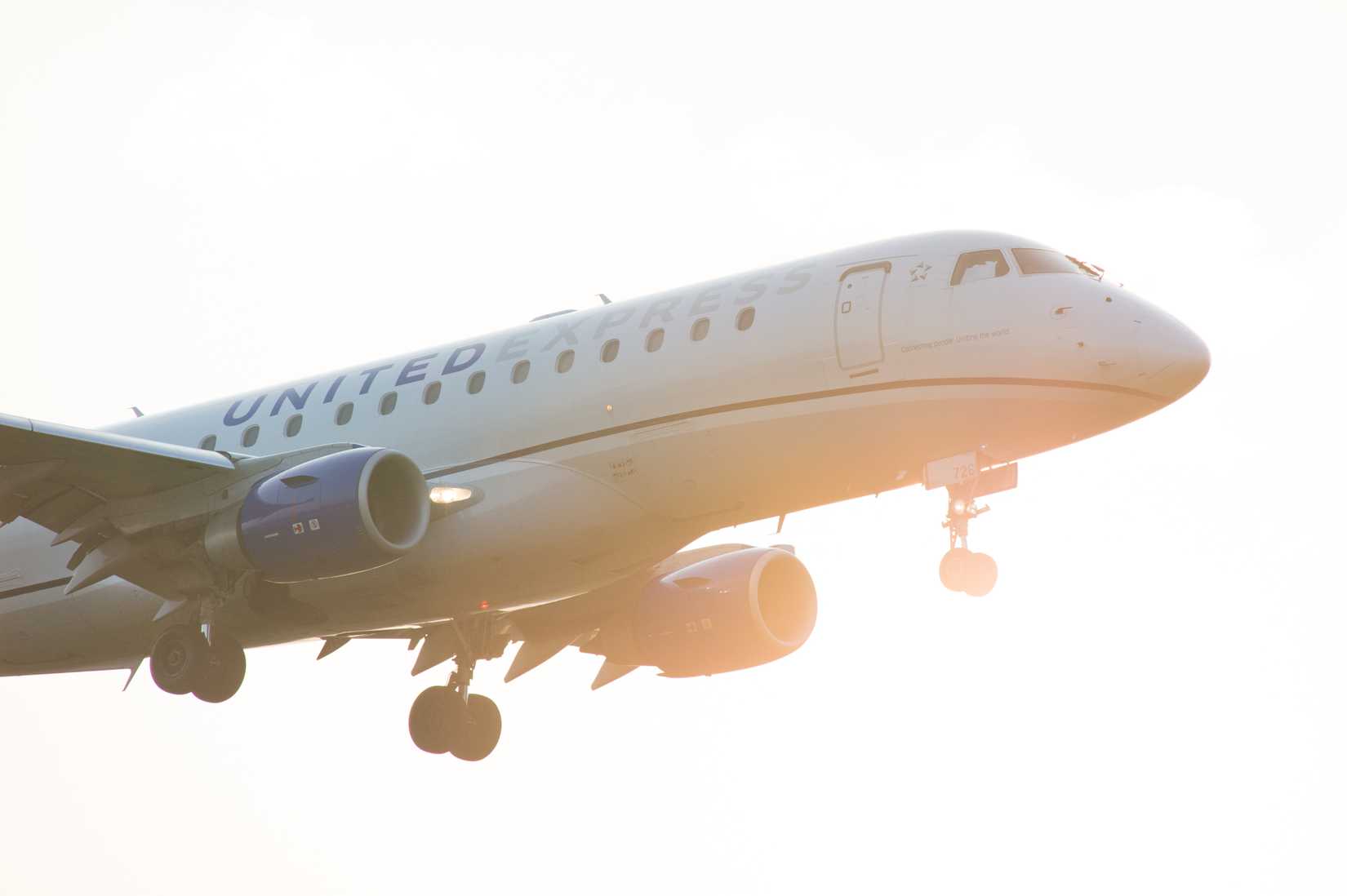 United Express Embraer 175 lands at Toronto Pearson International Airport.