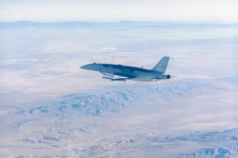 A photo of the Fury drone flying over a barren desert.