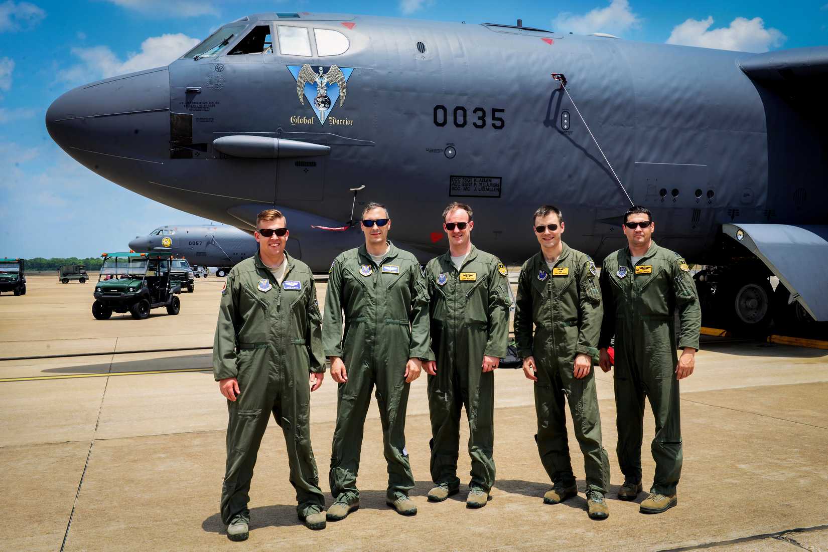 A B-52 stratofortress crew poses for a photo after a B-52 and B-1 Lancer integration flight at Barksdale Air Force Base, La., June 15, 2016.