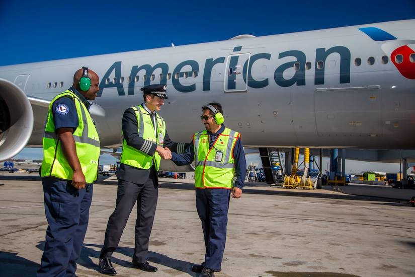 AA pilot and ground crew working together