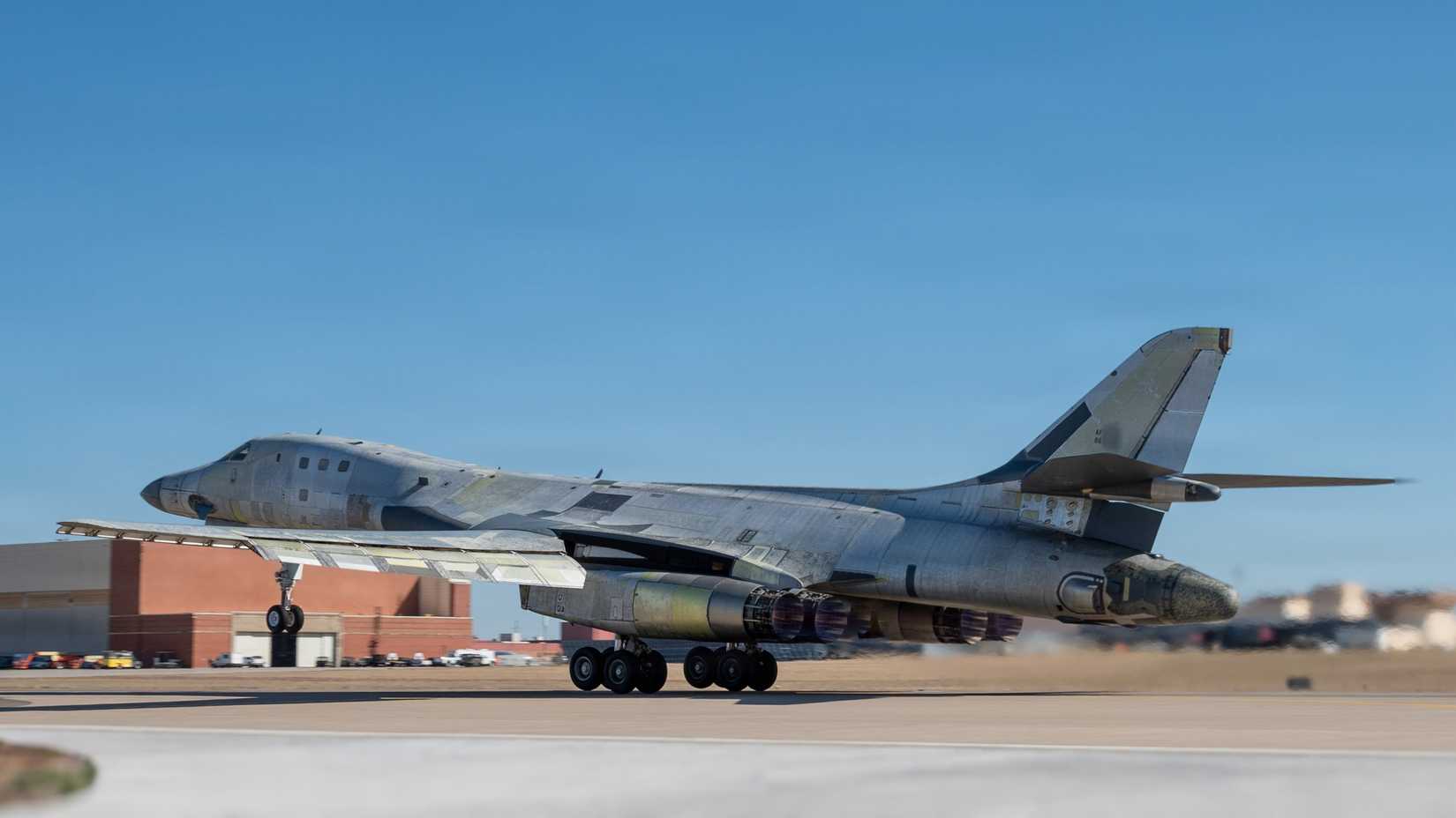 Air Force B-1B Lancer conducts a functional check flight at Tinker Air Force Base, Oklahoma, Feb. 26, 2026, in a stripped, bare-metal configuration.