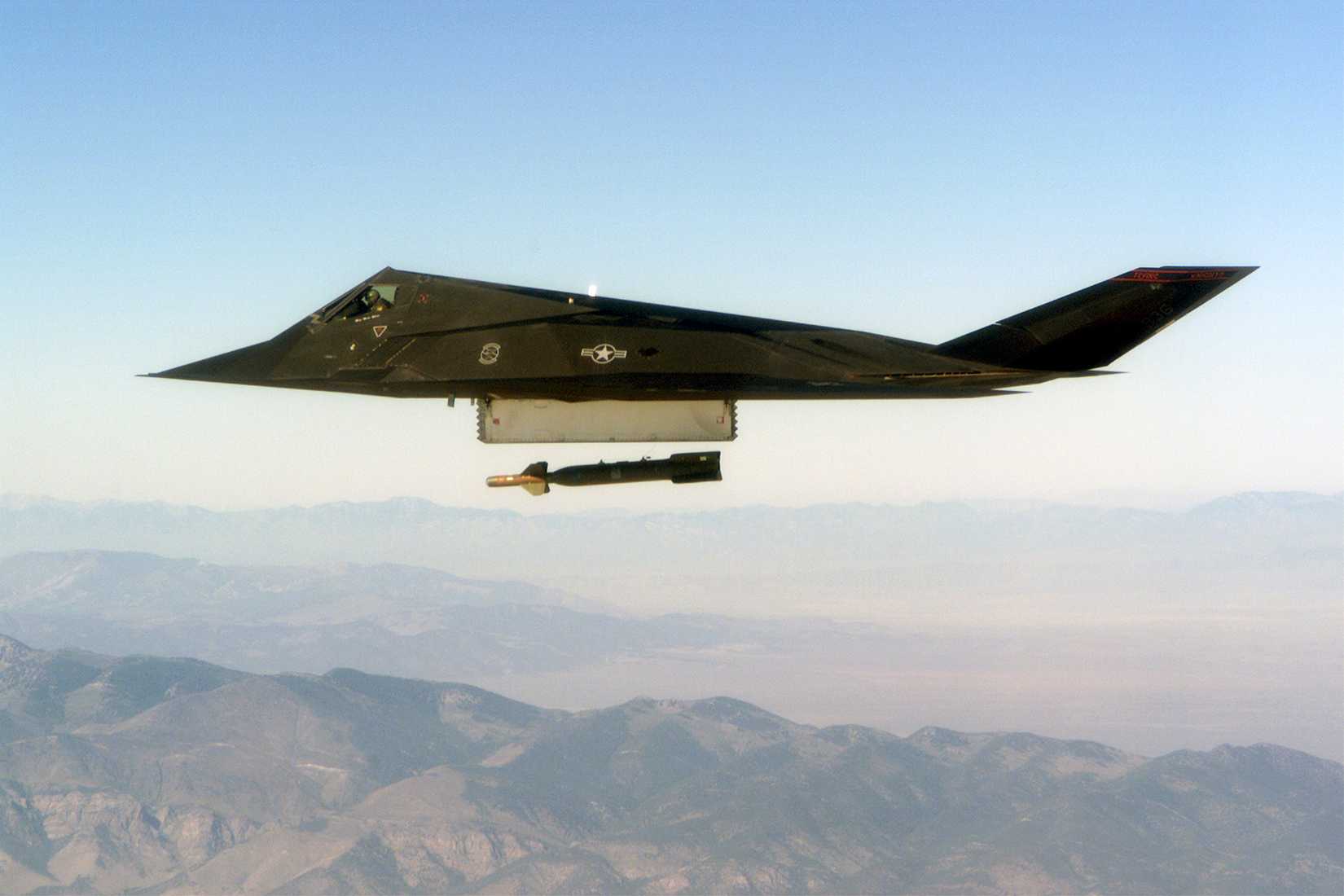 An F-117 Nighthawk engages it's target and drops a GBU-28 guided bomb unit during the 'live-fire' weapons testing mission